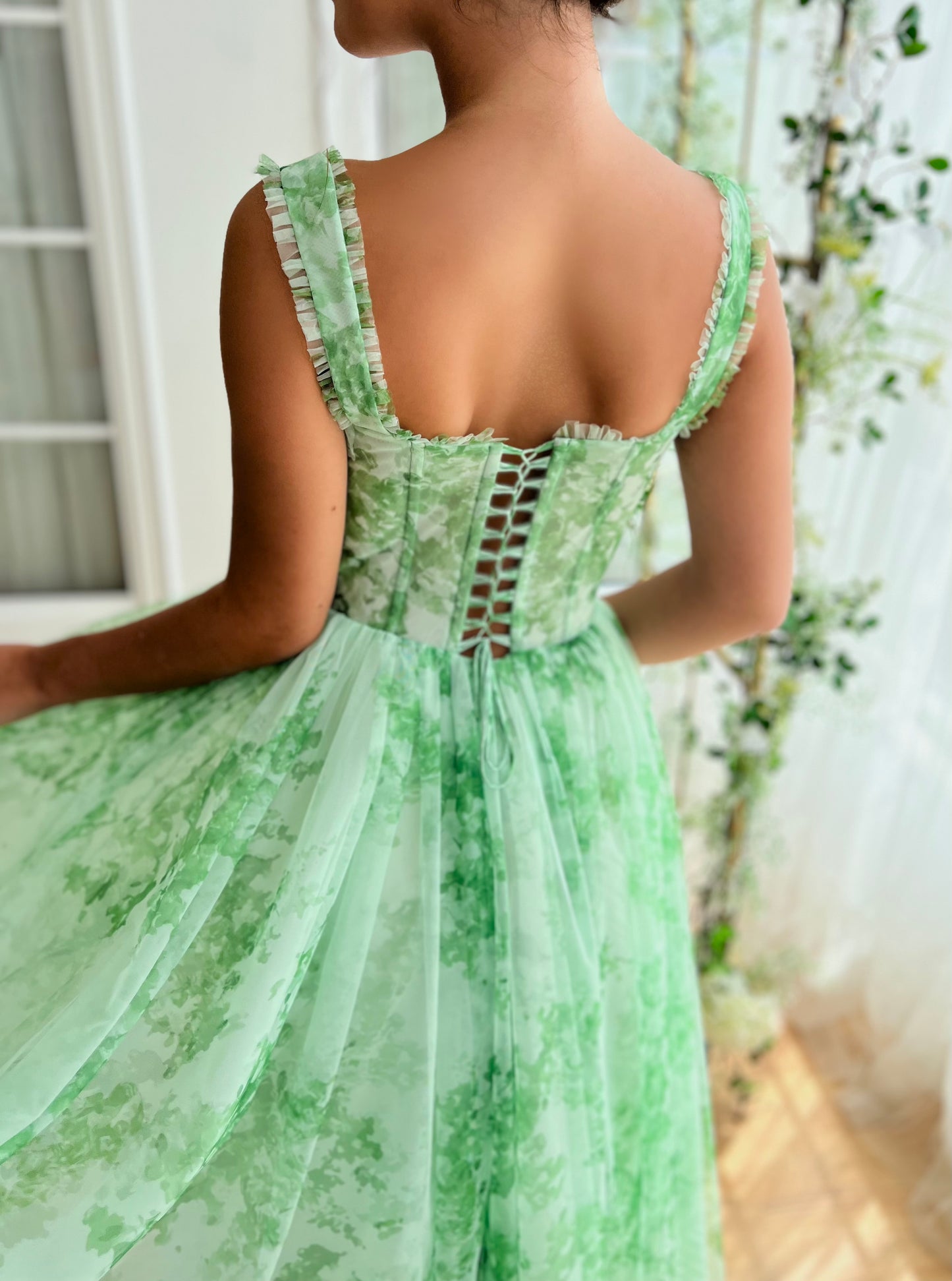 Green midi dress with printed fabric and straps