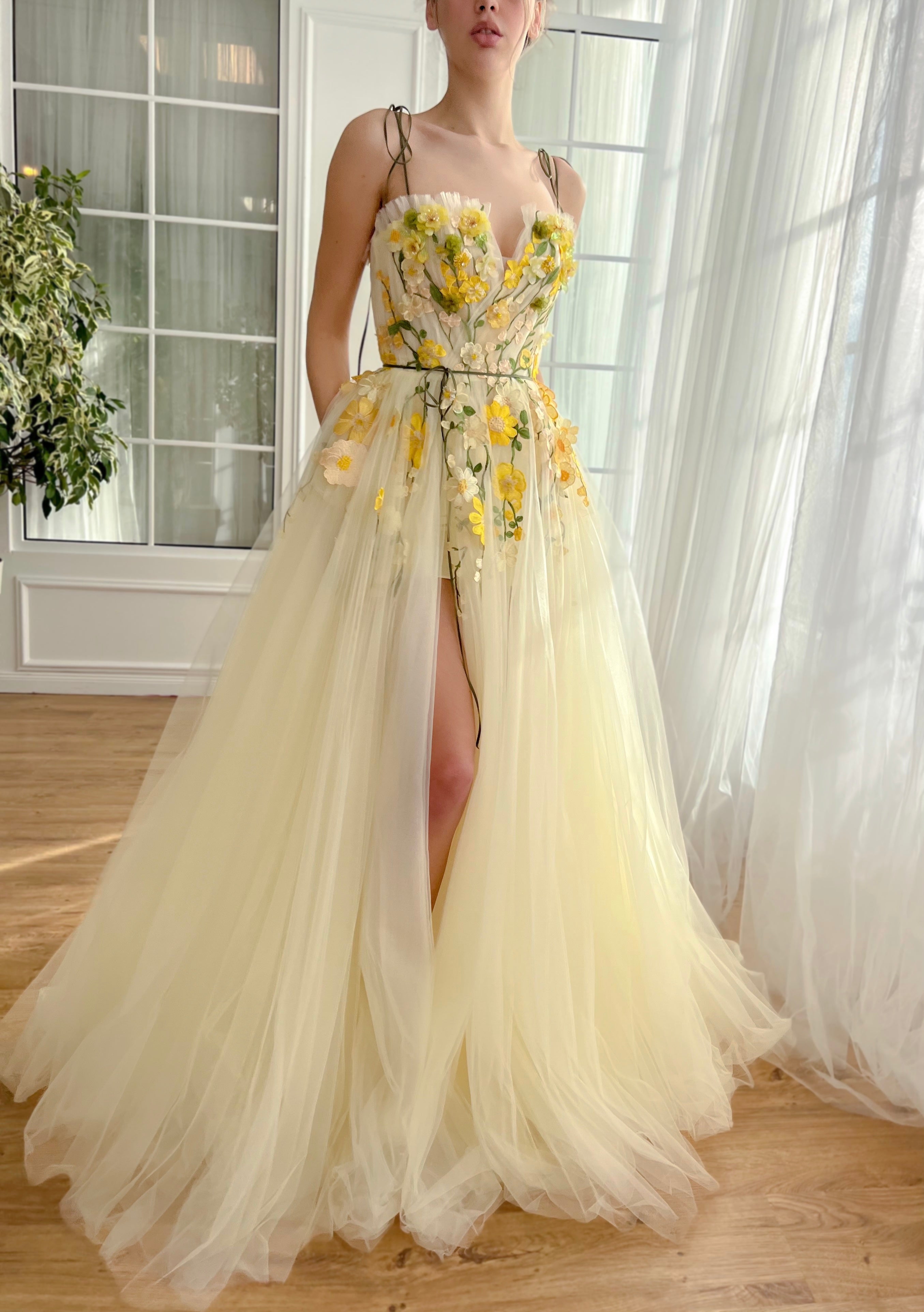 Yellow A-Line dress with spaghetti straps and embroidered flowers