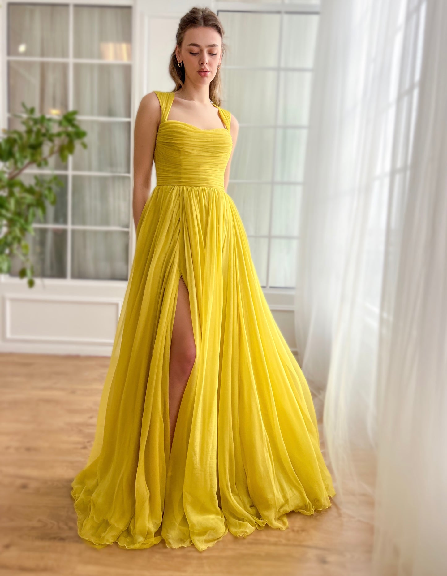 Yellow A-Line dress with embroidery and cape sleeves