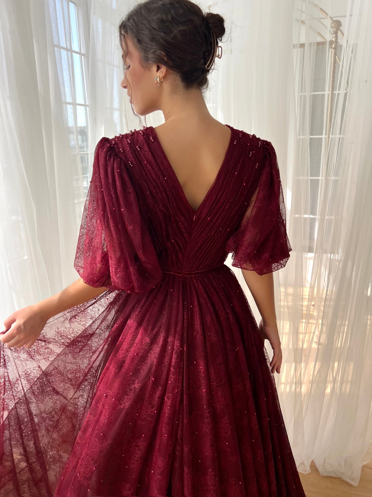 Maroon A-Line gown with short sleeves, embroidery and v-neck