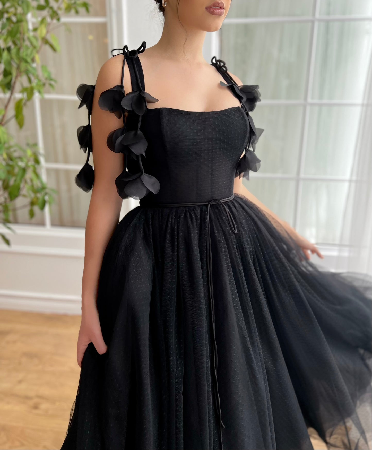 Black midi dress with embroidered flowers and straps
