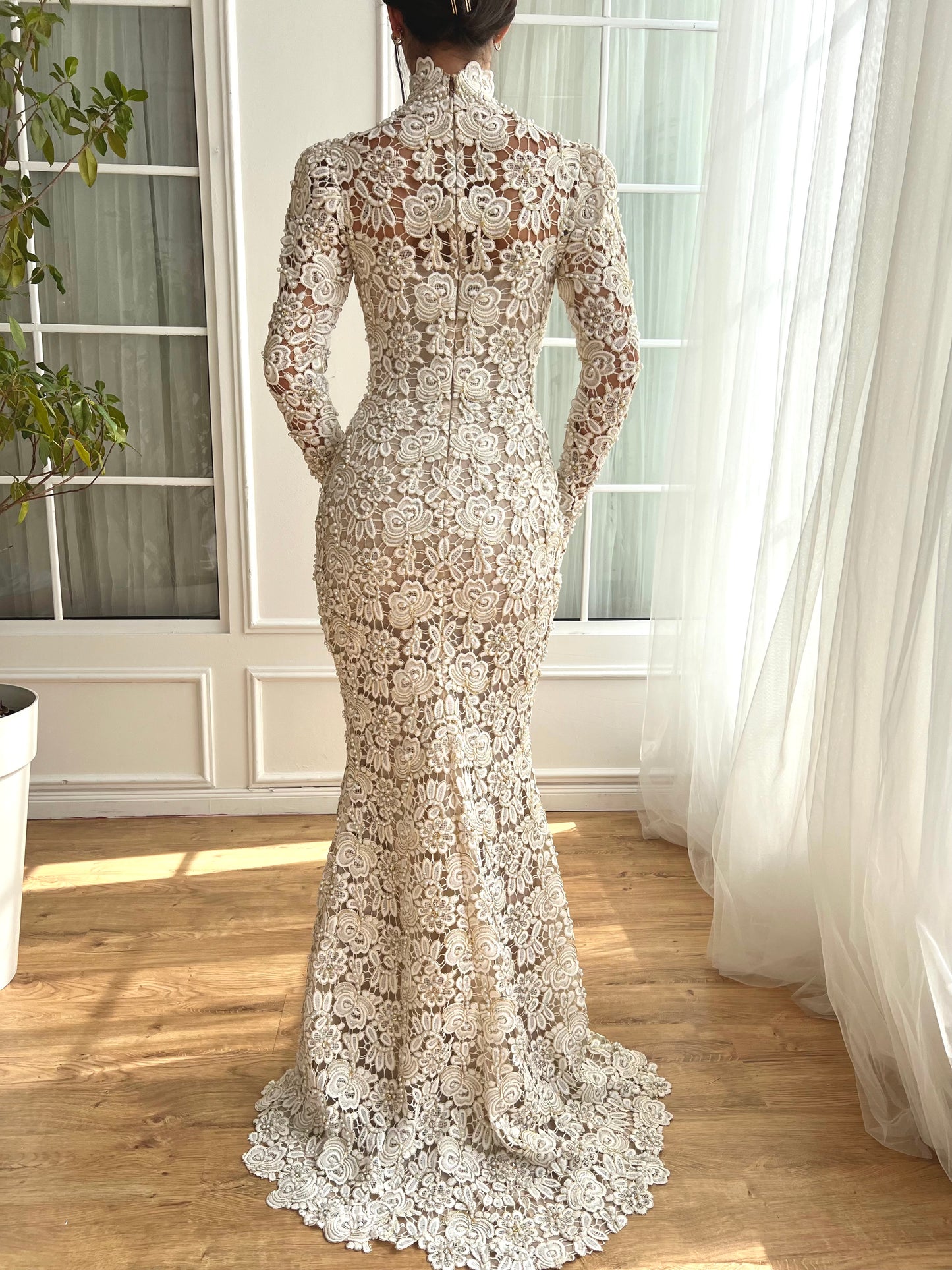 White bridal mermaid dress with long sleeves and lace