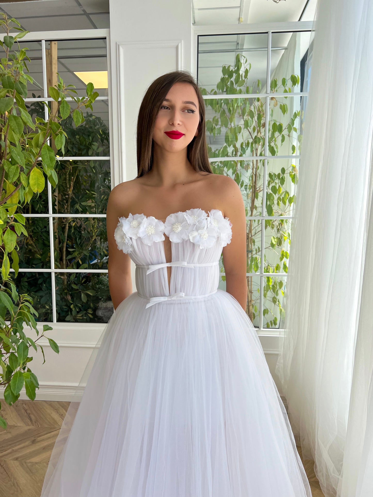 White A-Line dress with no sleeves and embroidery