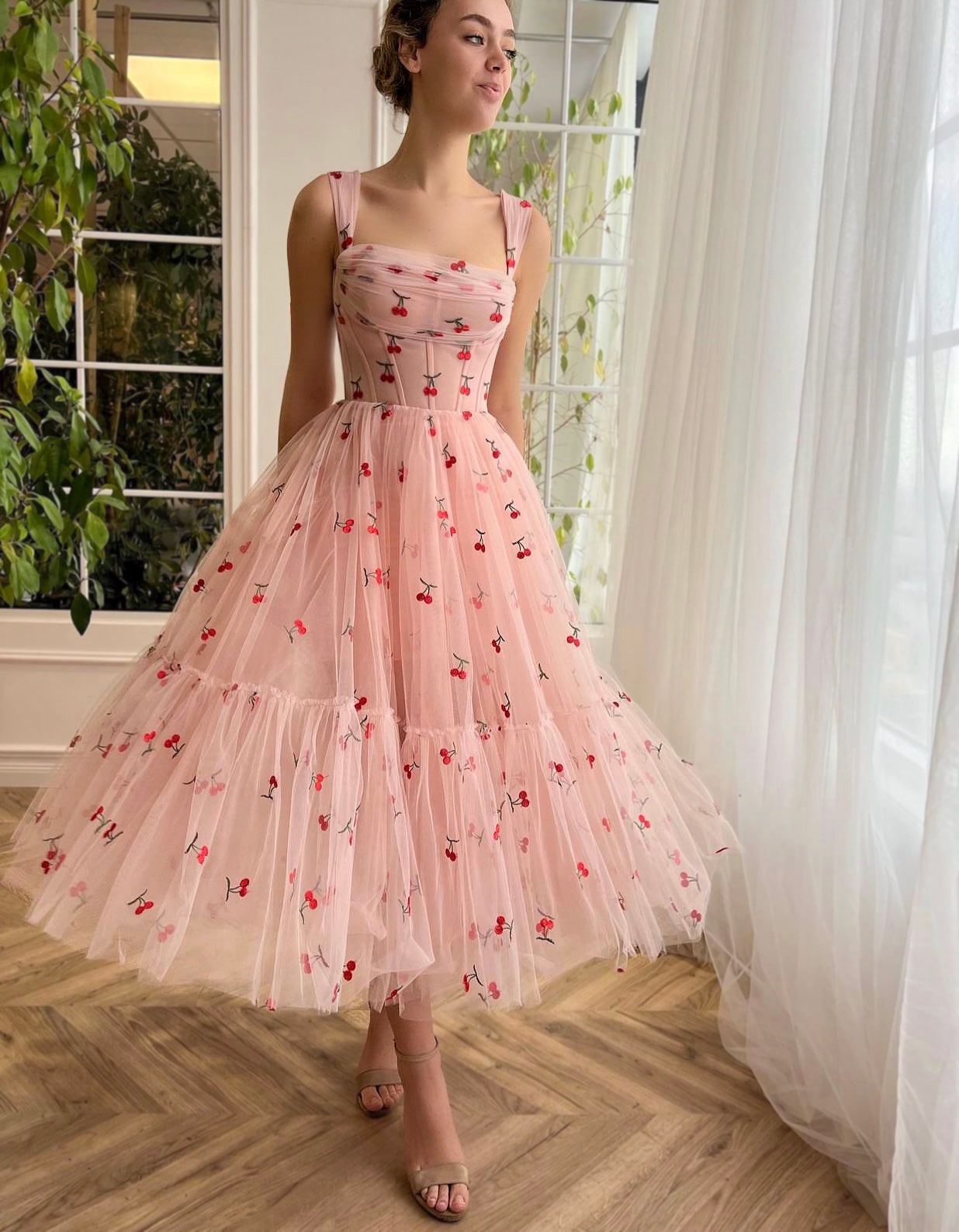 Pink midi dress with printed cherries and straps
