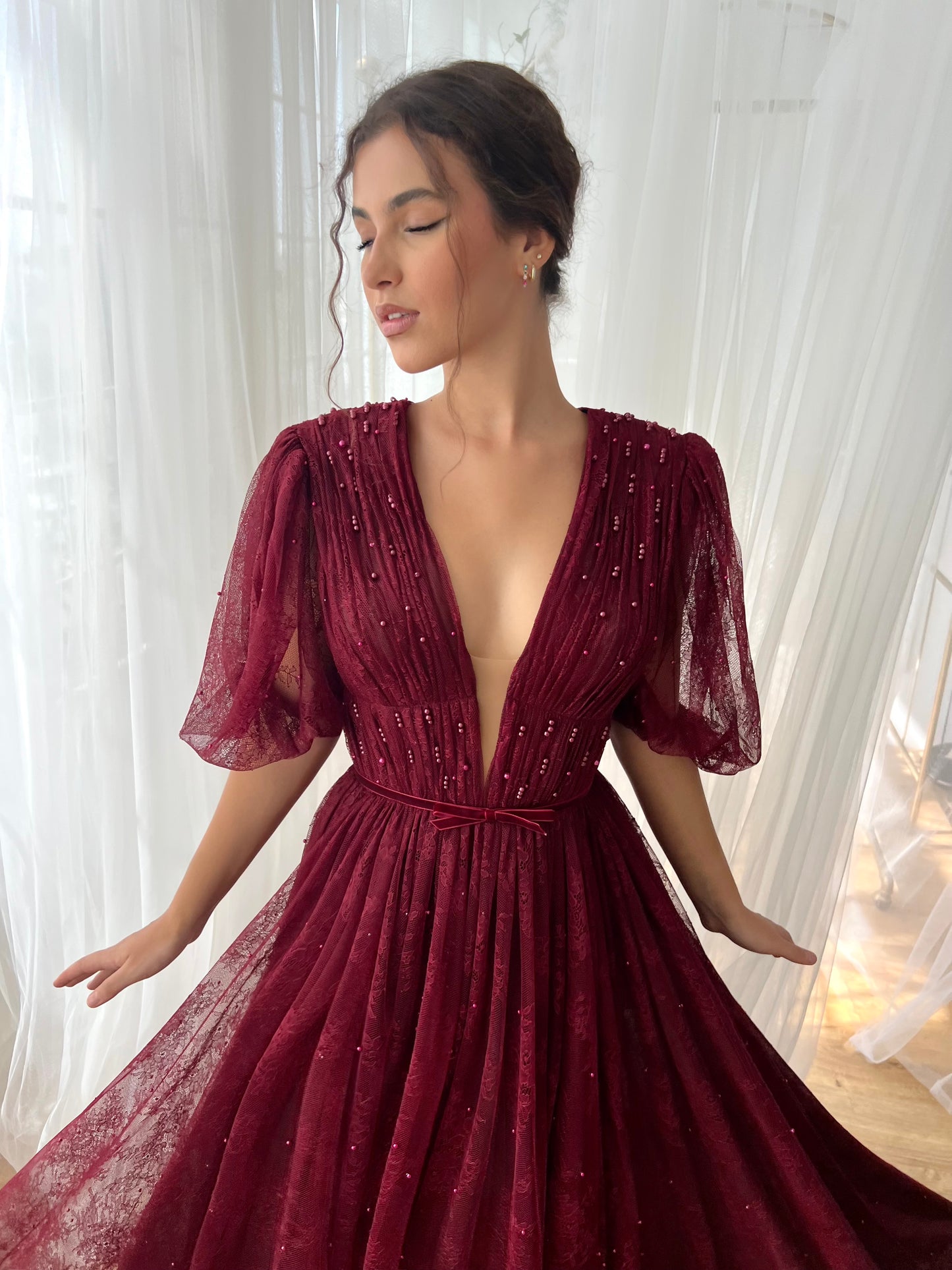 Maroon A-Line gown with short sleeves, embroidery and v-neck
