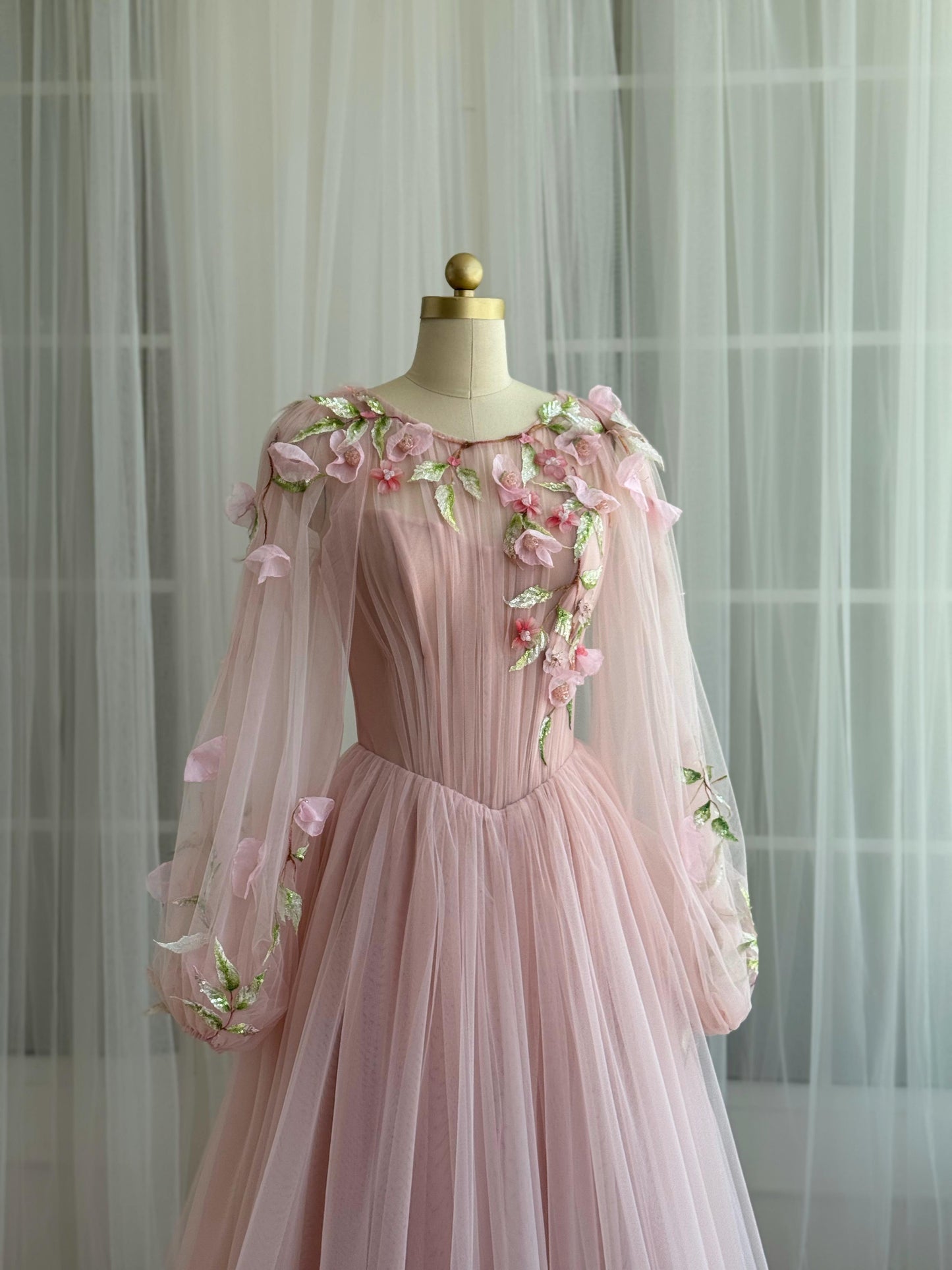 Pink A-Line gown with tulle, long sleeves and embroidery