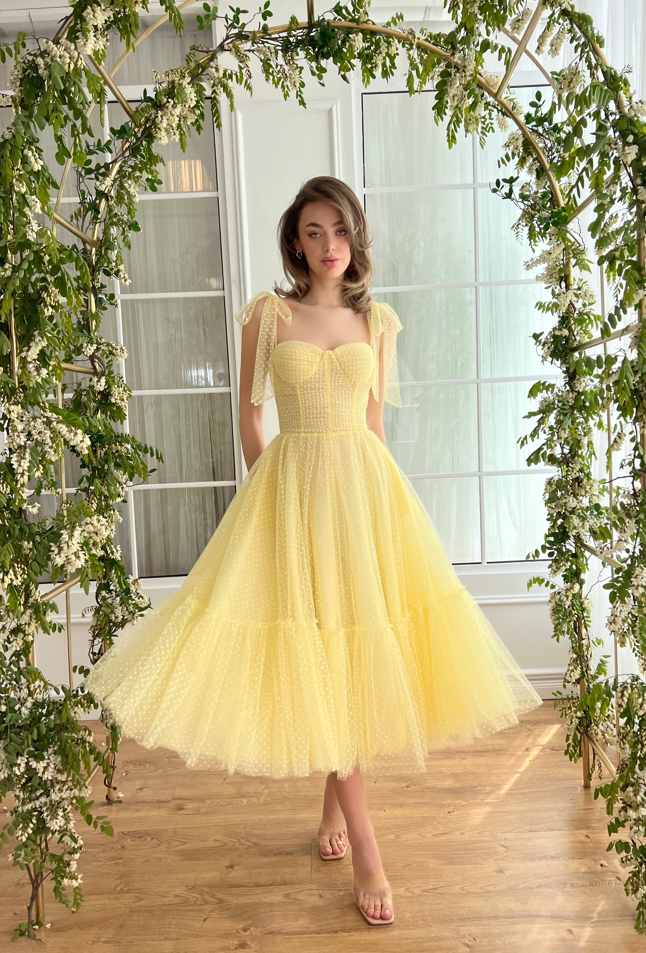 Yellow midi dress with off the shoulder sleeves and embroidery