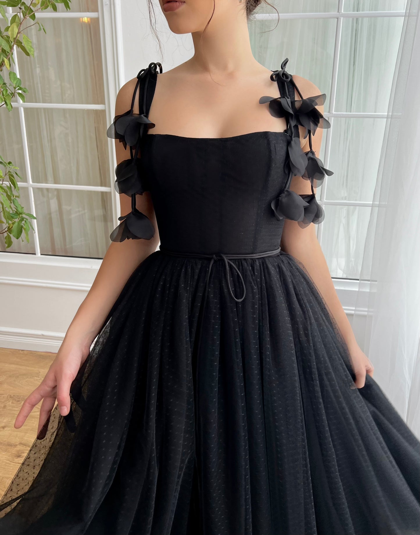 Black midi dress with embroidered flowers and straps