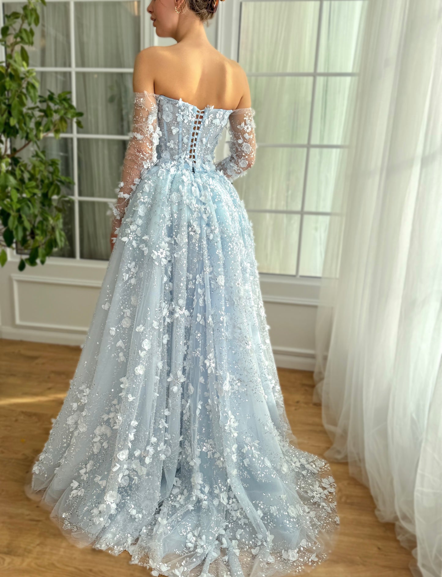 Light blue A-Line dress with long off the shoulder sleeves, overskirt and embroidery