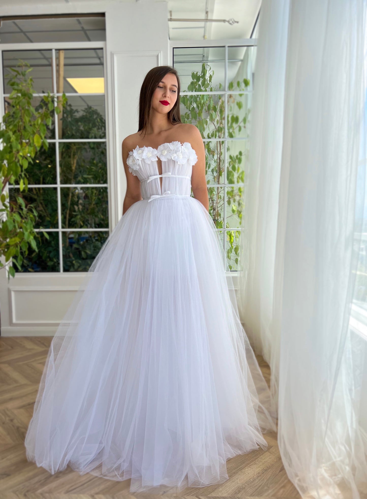White A-Line dress with no sleeves and embroidery