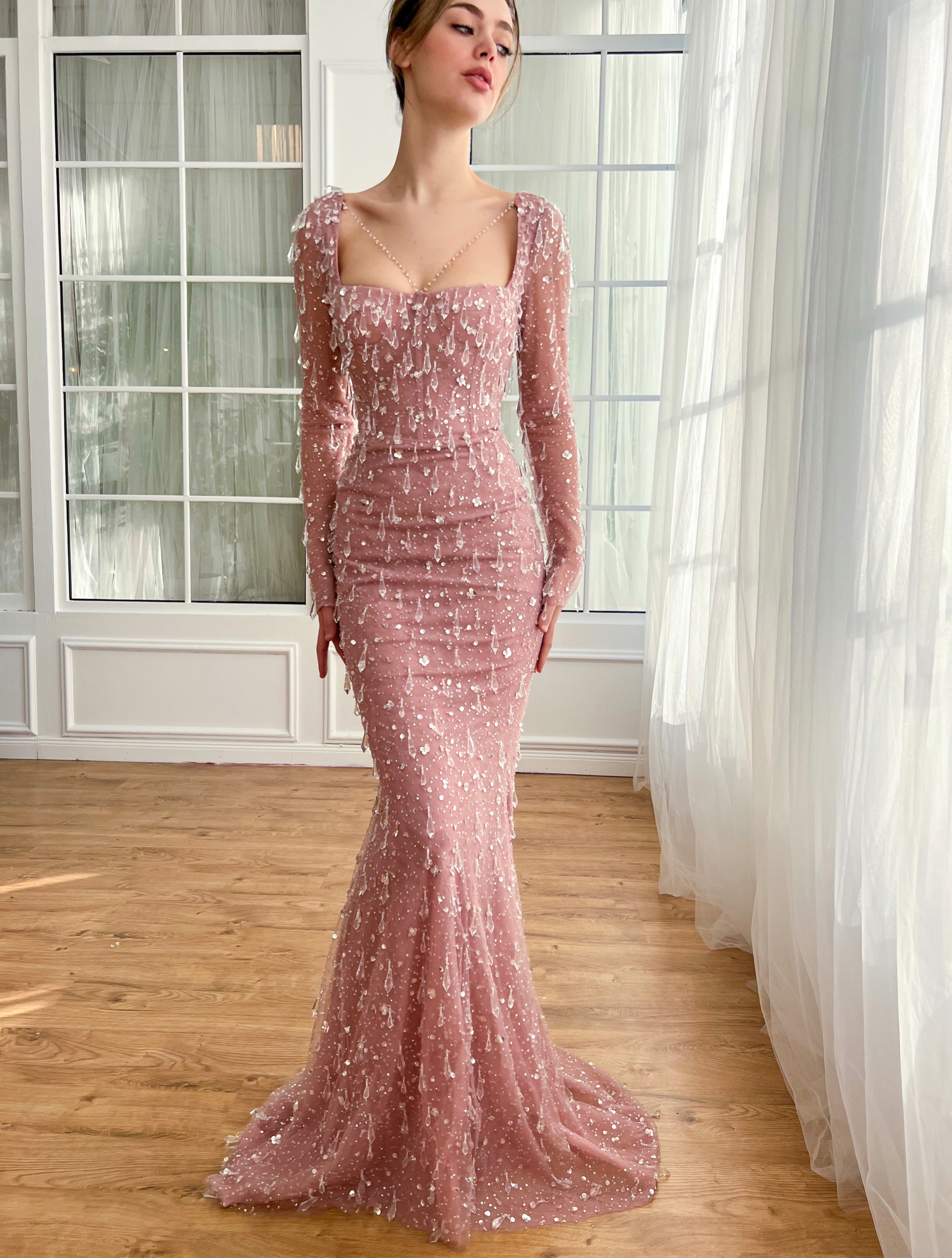Pink mermaid dress with embroidered crystals and long sleeves