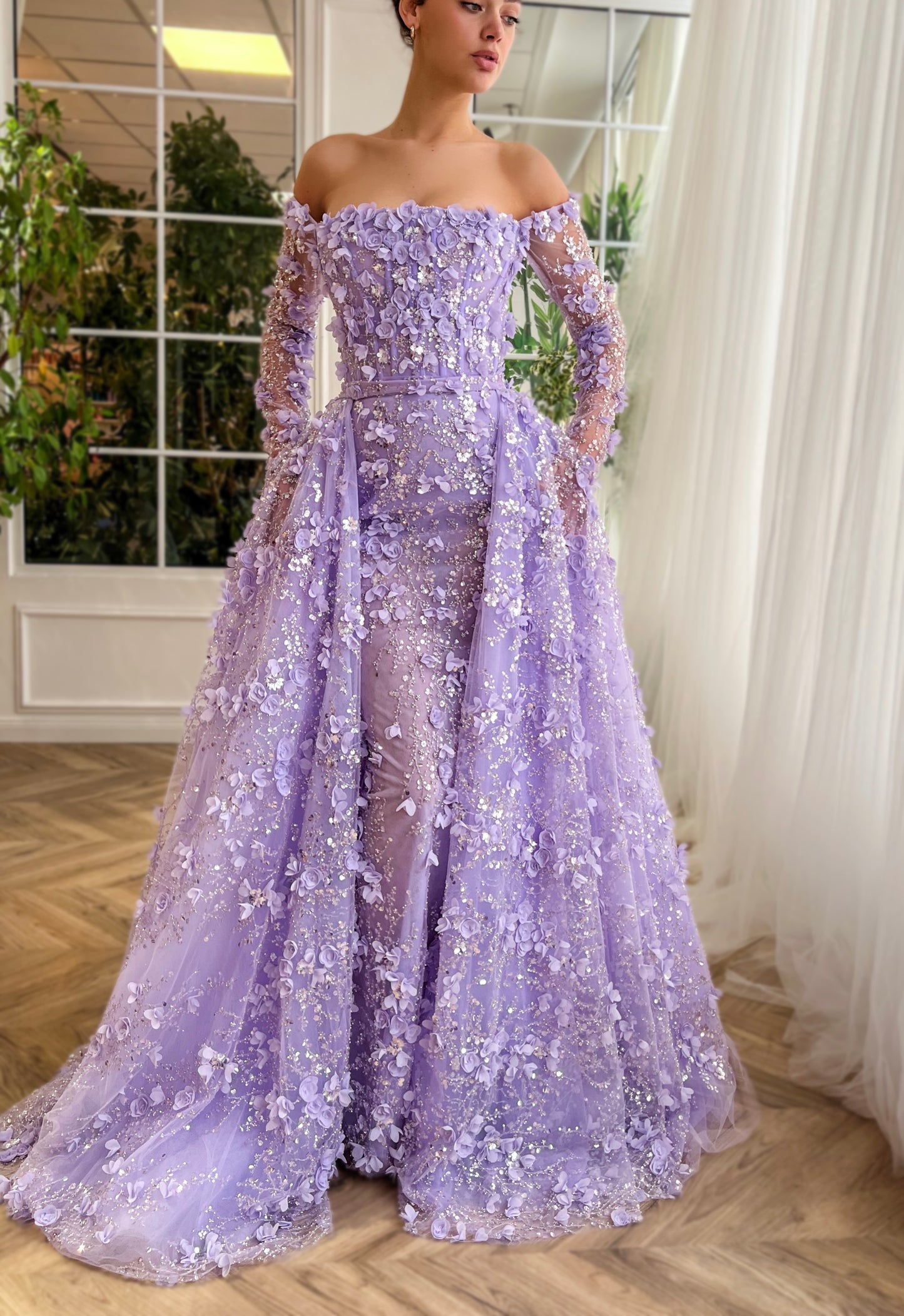 Purple overskirt dress with long off the shoulder sleeves and embroidered flowers