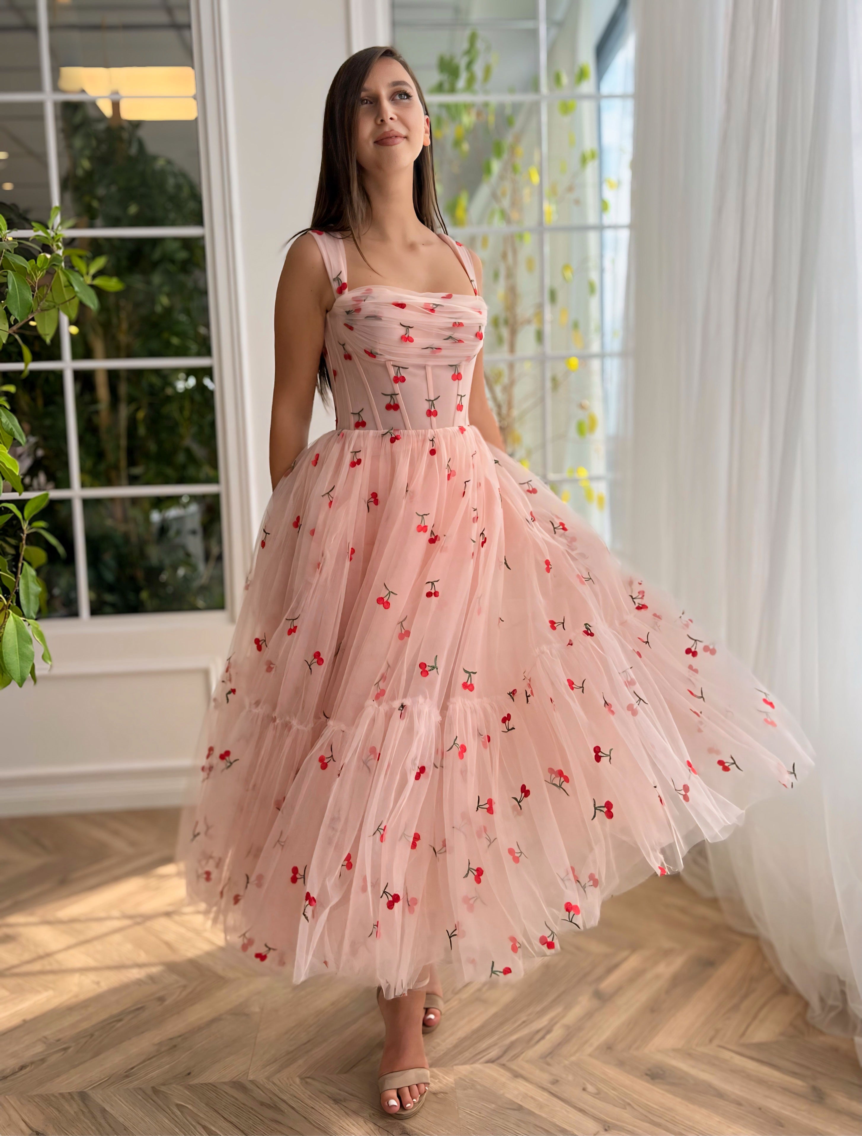 Pink midi dress with printed cherries and straps