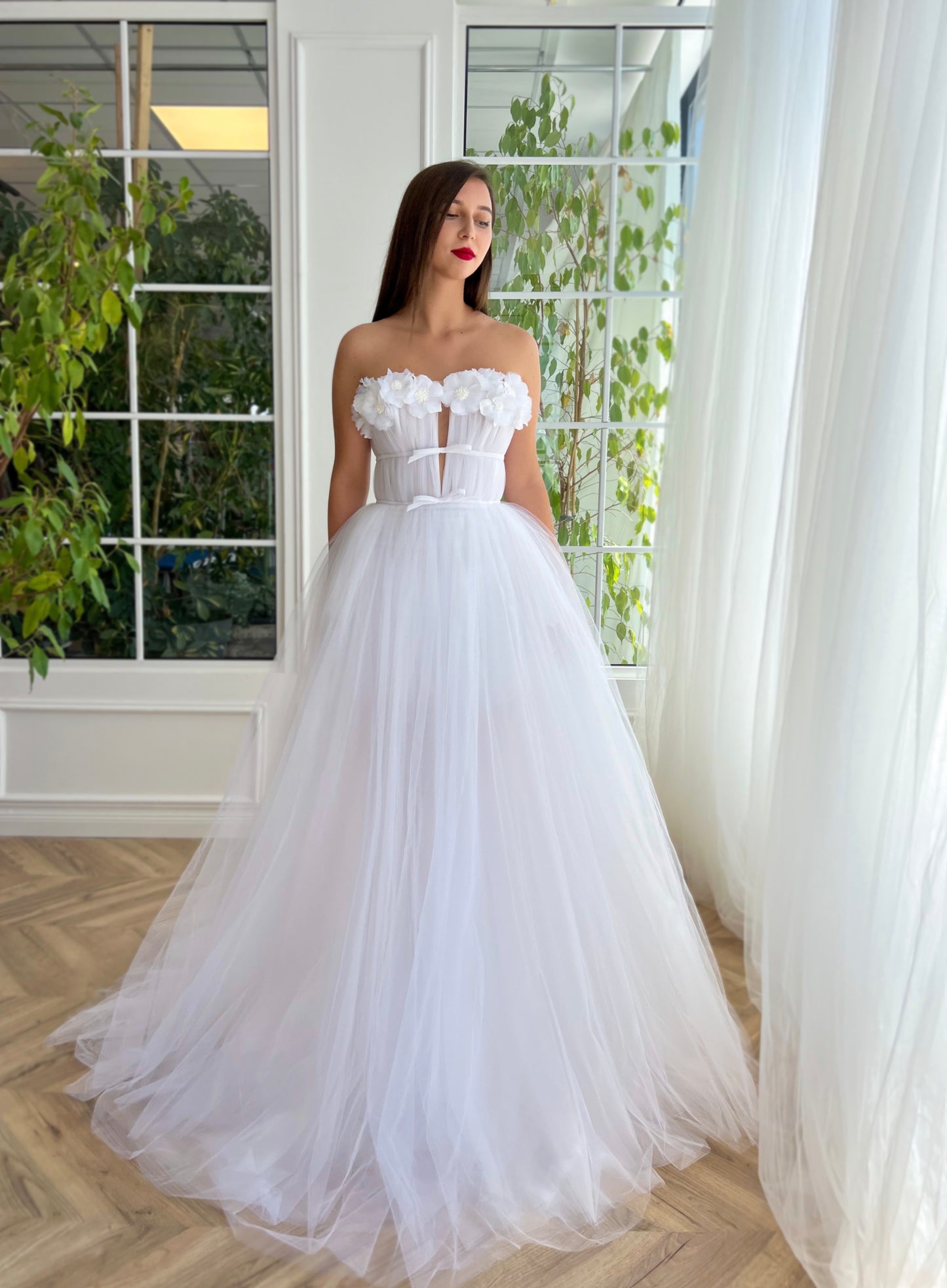 White A-Line dress with no sleeves and embroidery