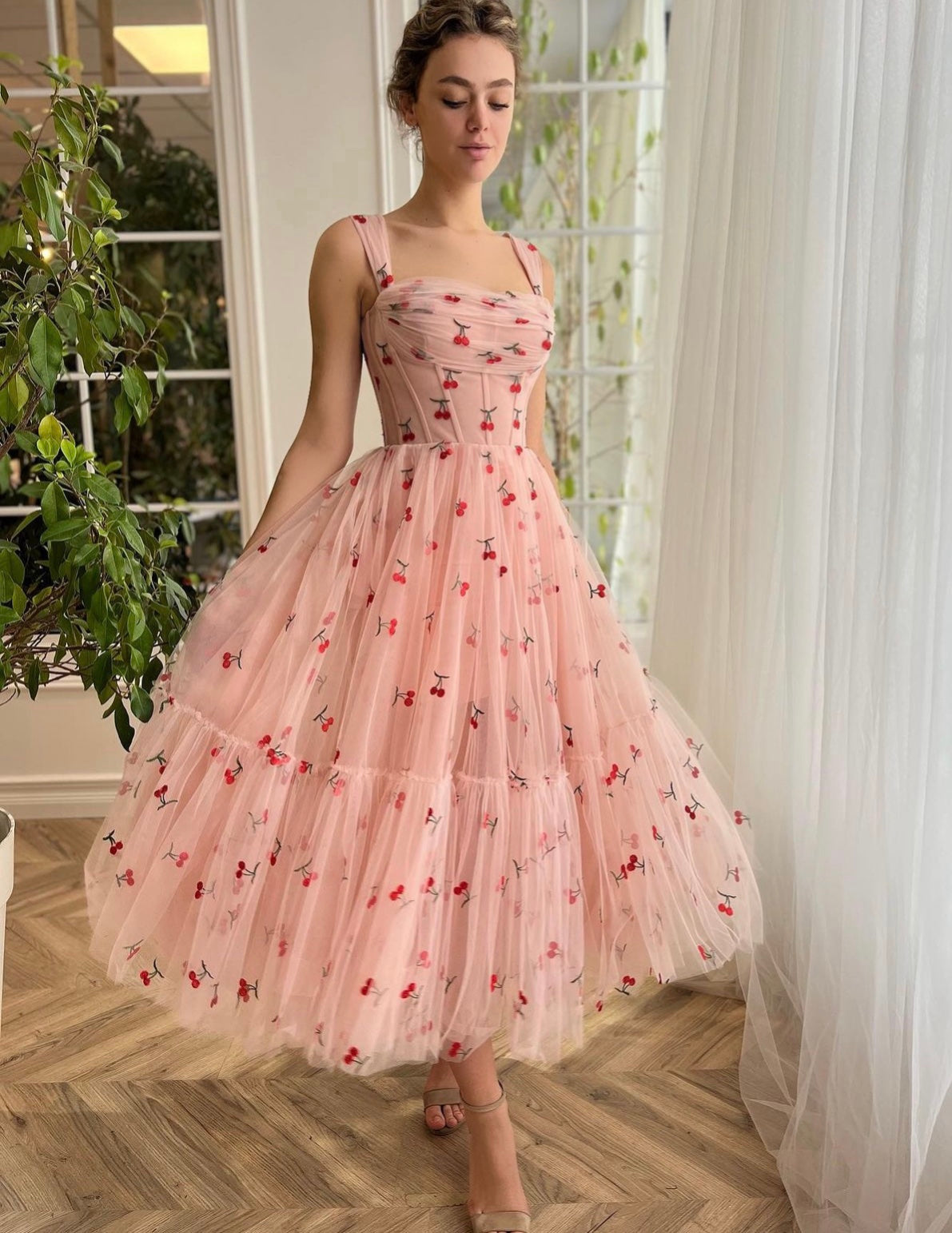 Pink midi dress with printed cherries and straps