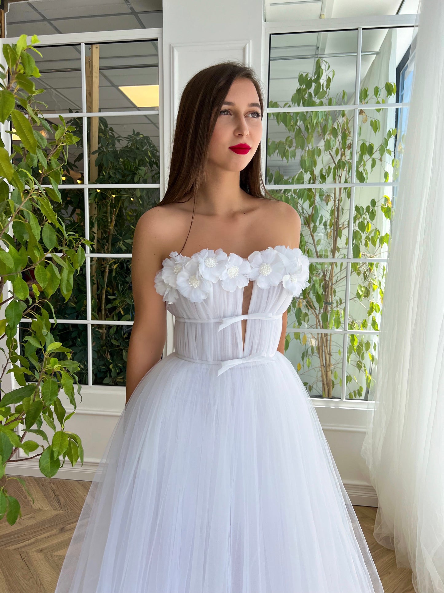 White A-Line dress with no sleeves and embroidery