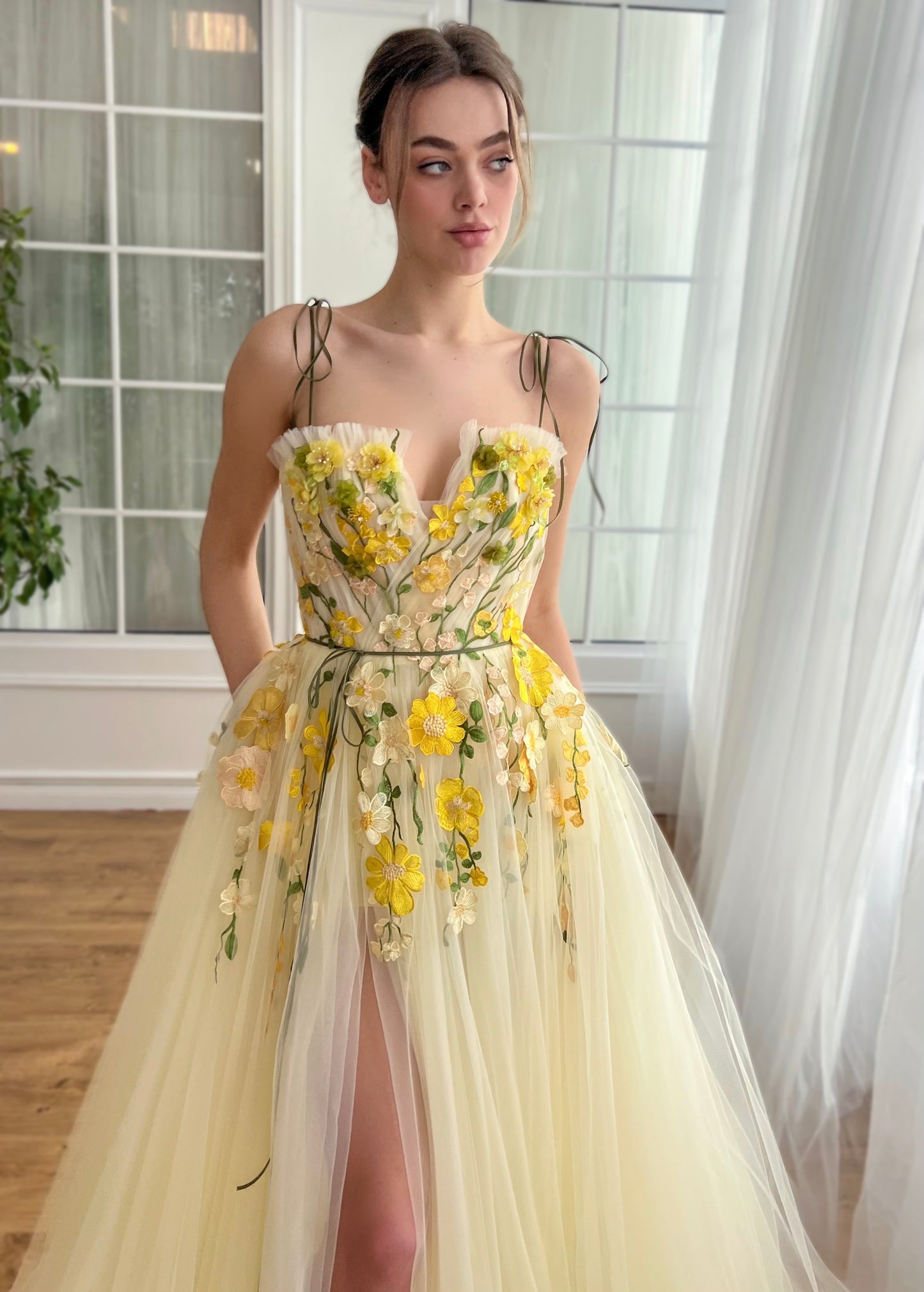Yellow A-Line dress with spaghetti straps and embroidered flowers