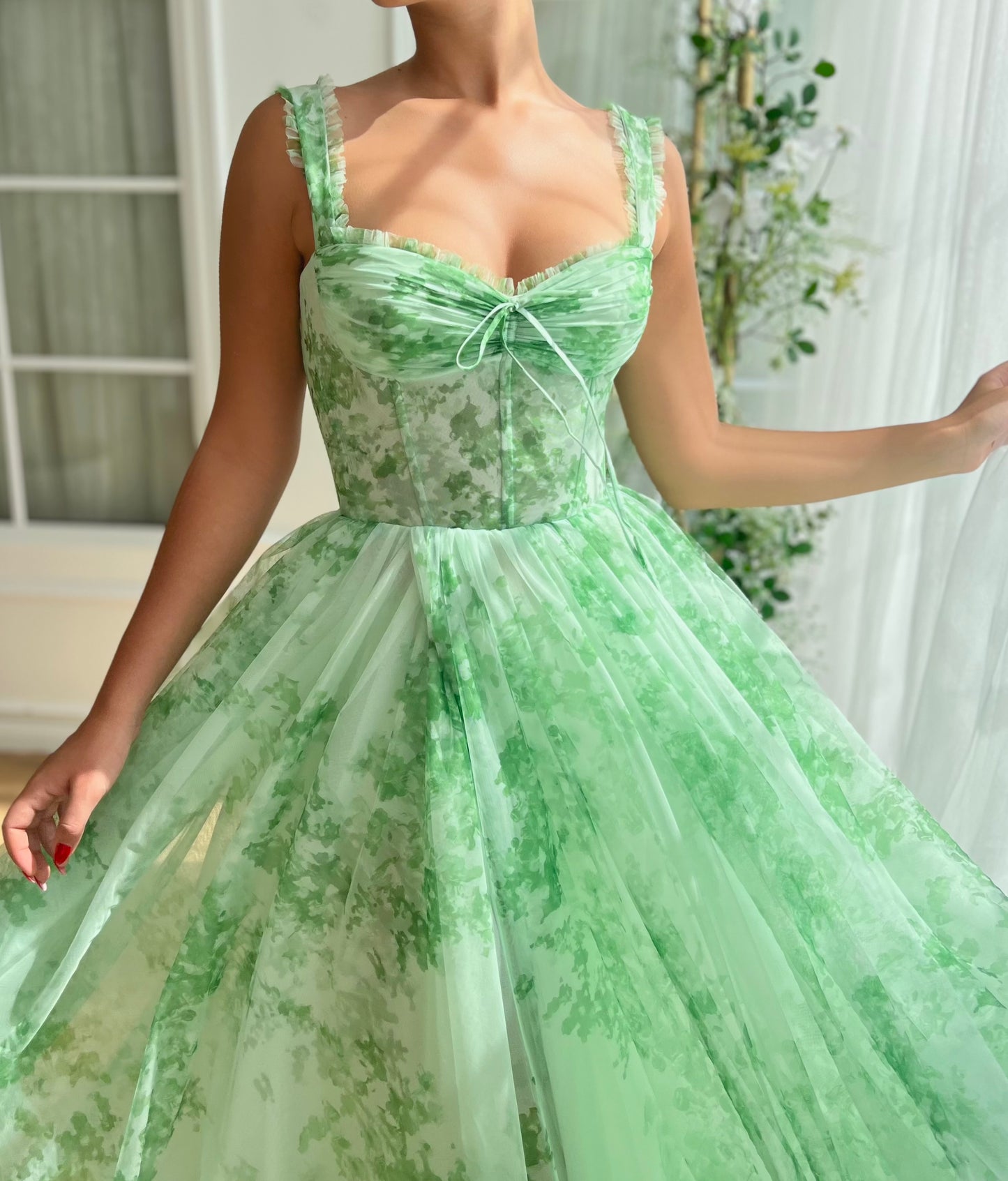 Green A-Line dress with straps and printed fabric