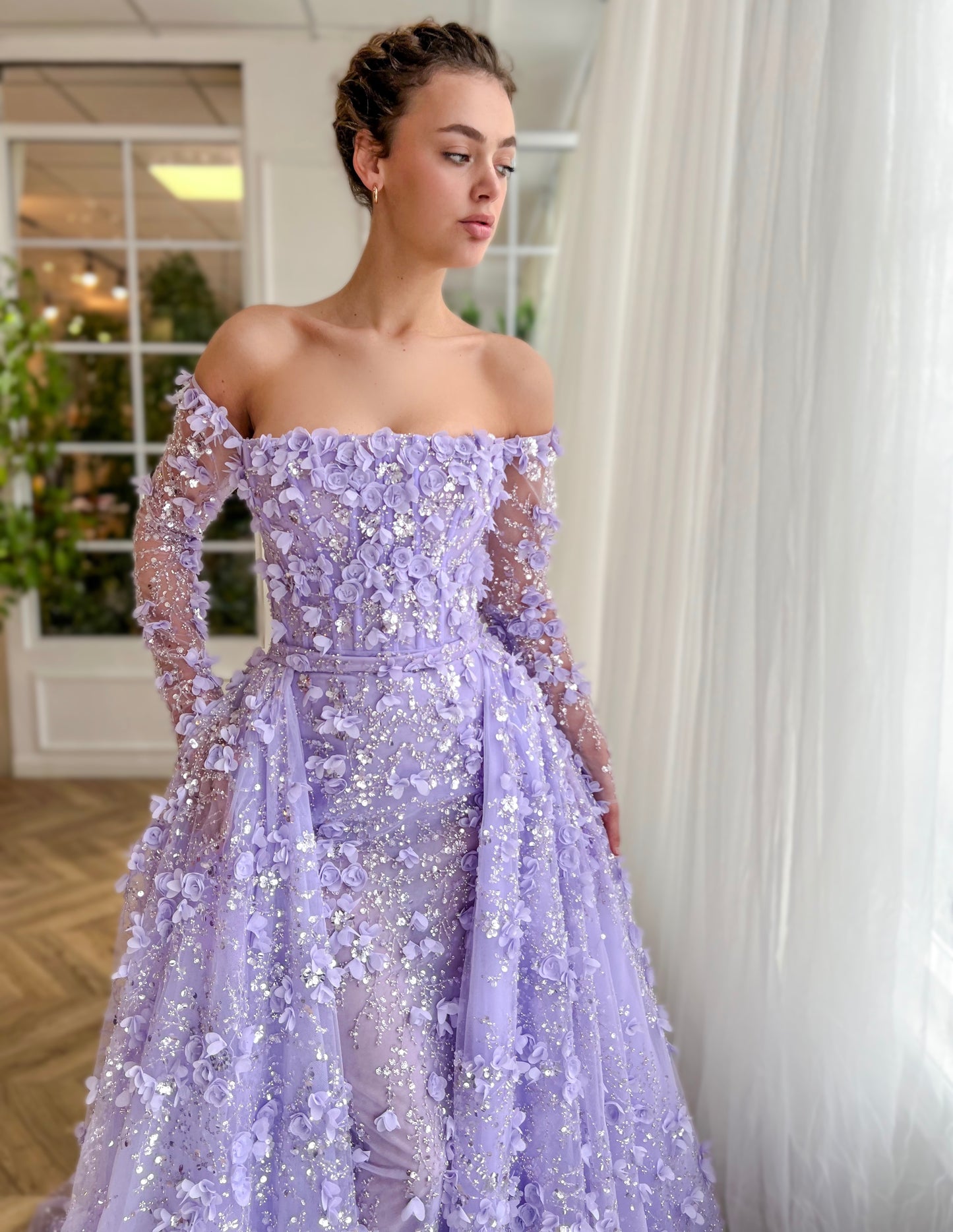 Purple overskirt dress with long off the shoulder sleeves and embroidered flowers