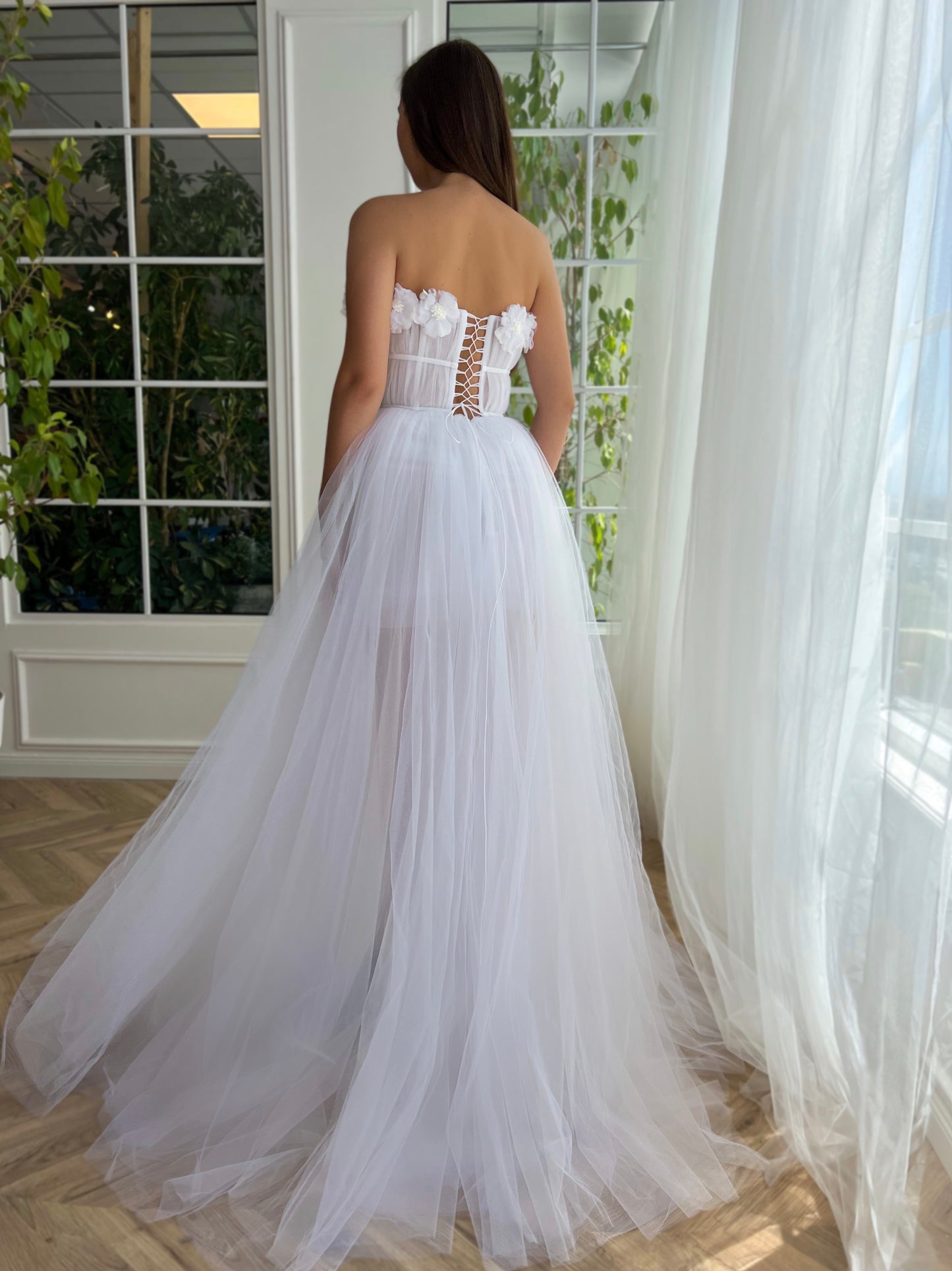 White A-Line dress with no sleeves and embroidery