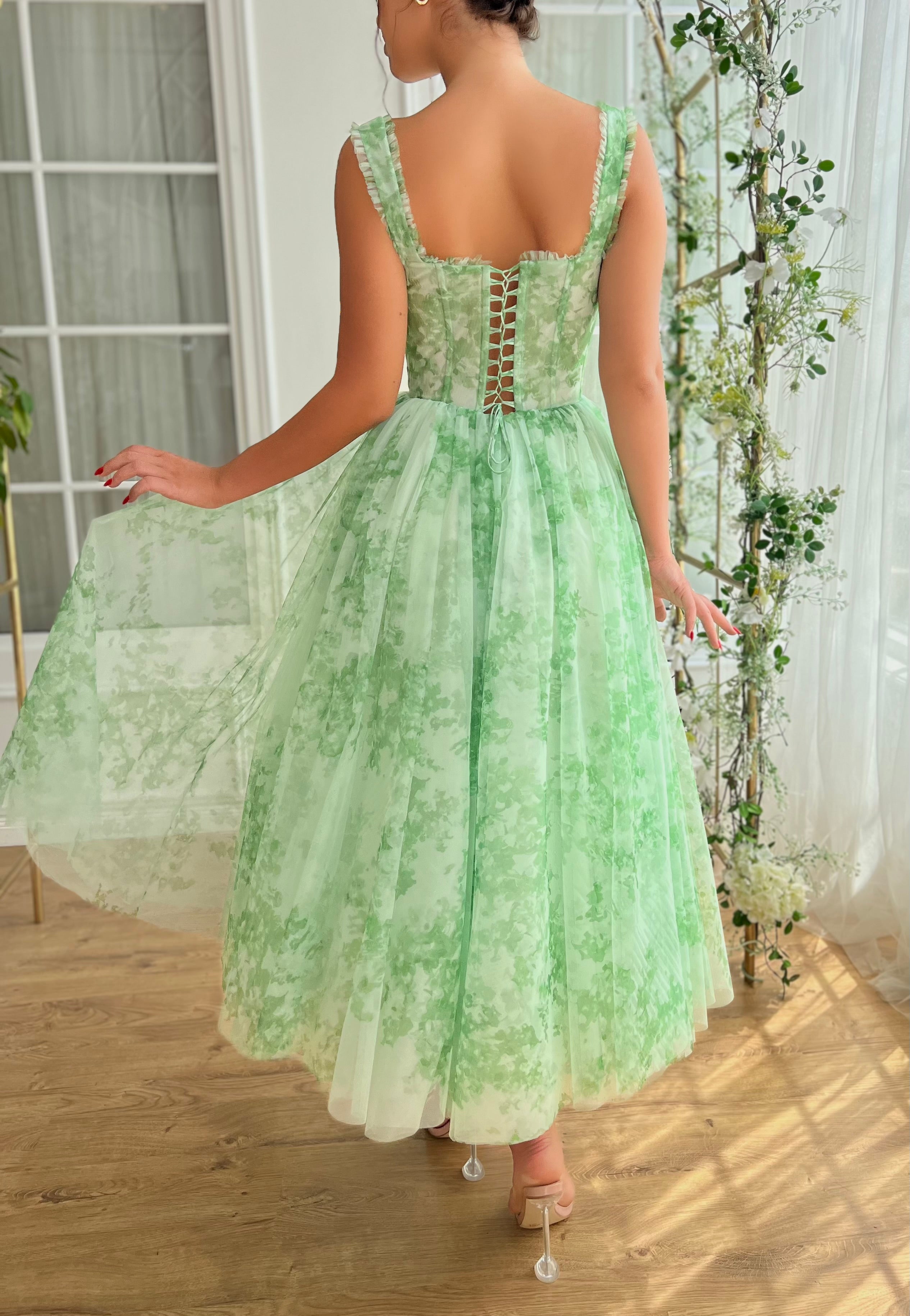 Green midi dress with printed fabric and straps