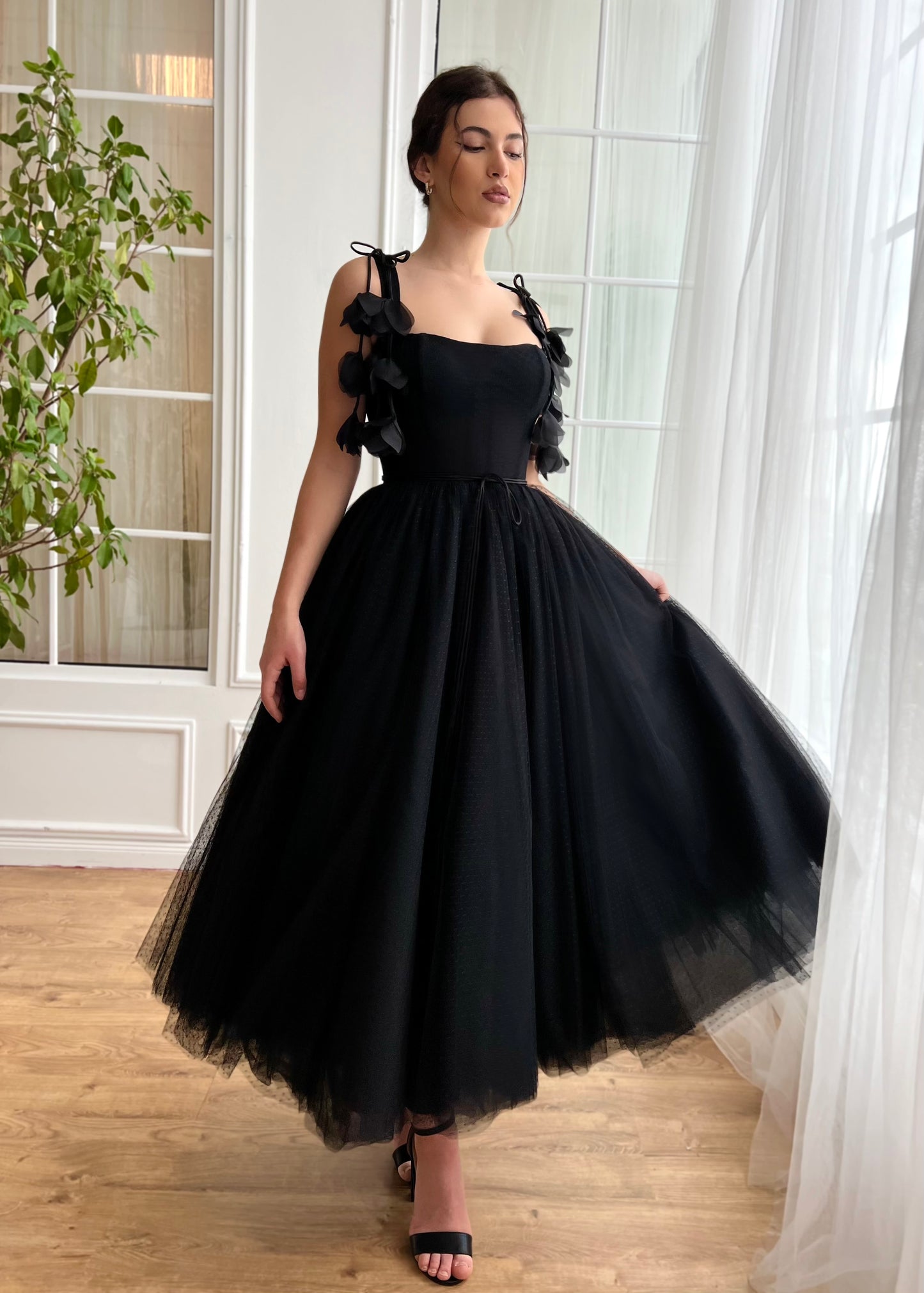 Black midi dress with embroidered flowers and straps