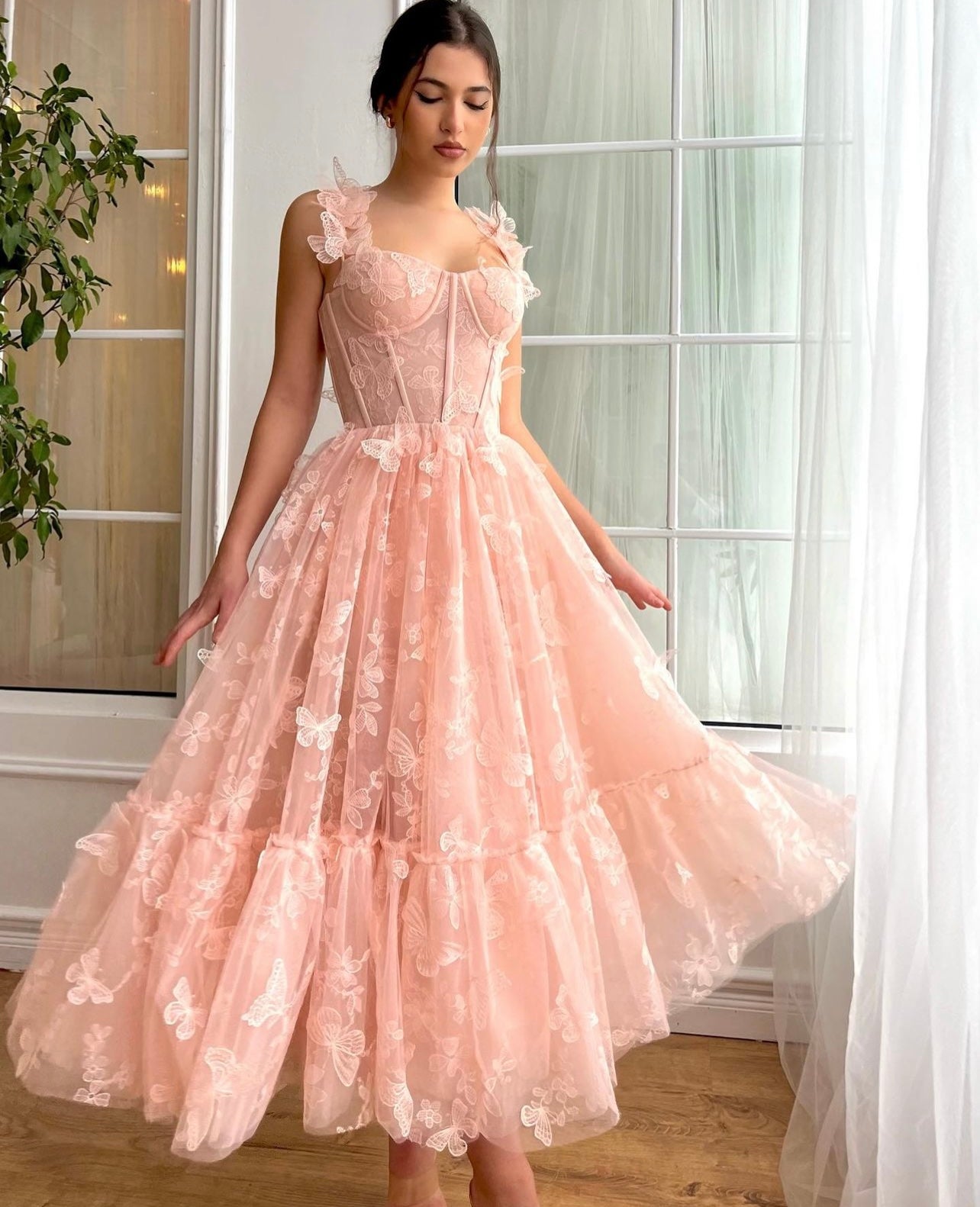 Pink midi dress with embroidered butterflies and straps