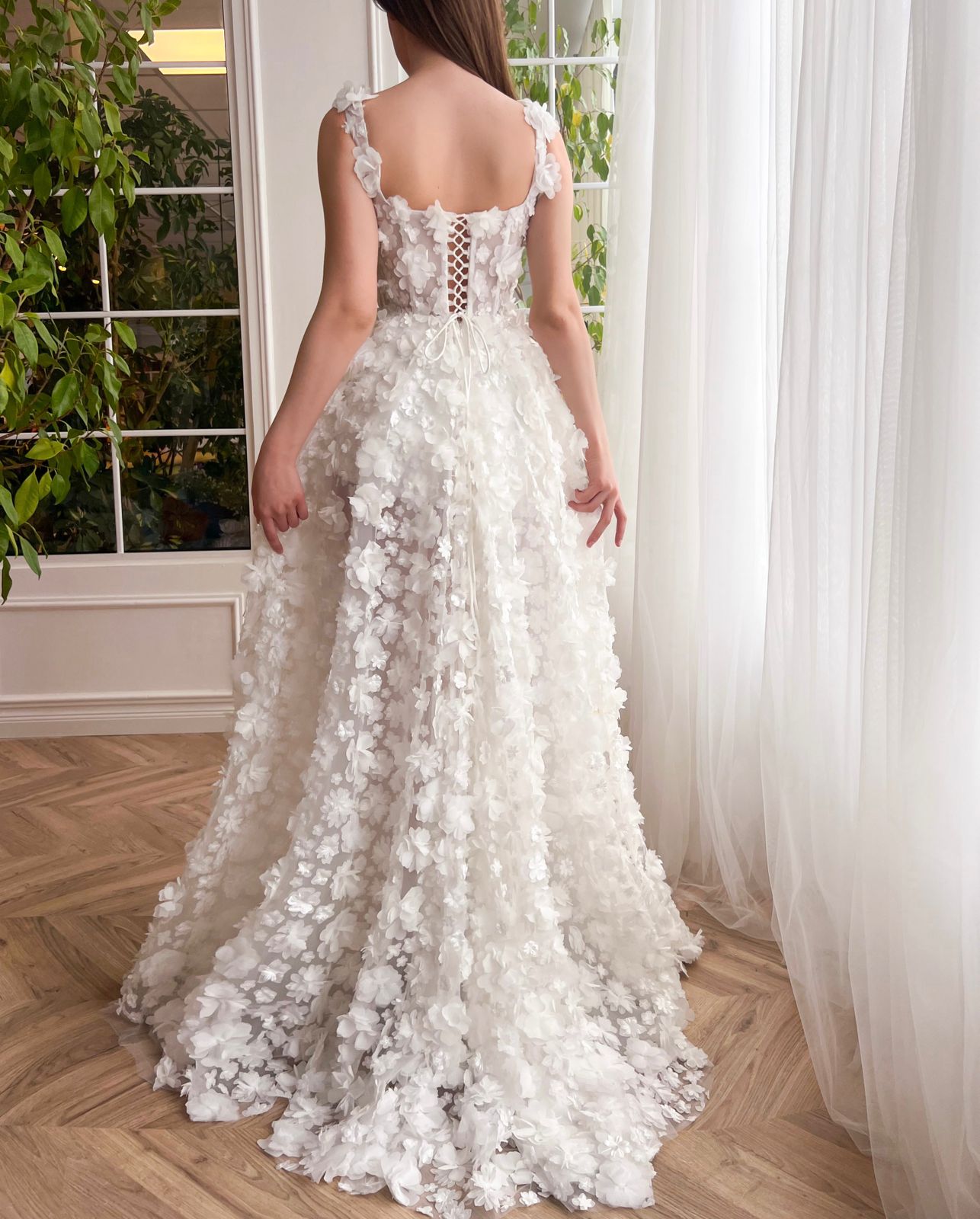 White A-Line bridal dress with spaghetti straps, lace and embroidery