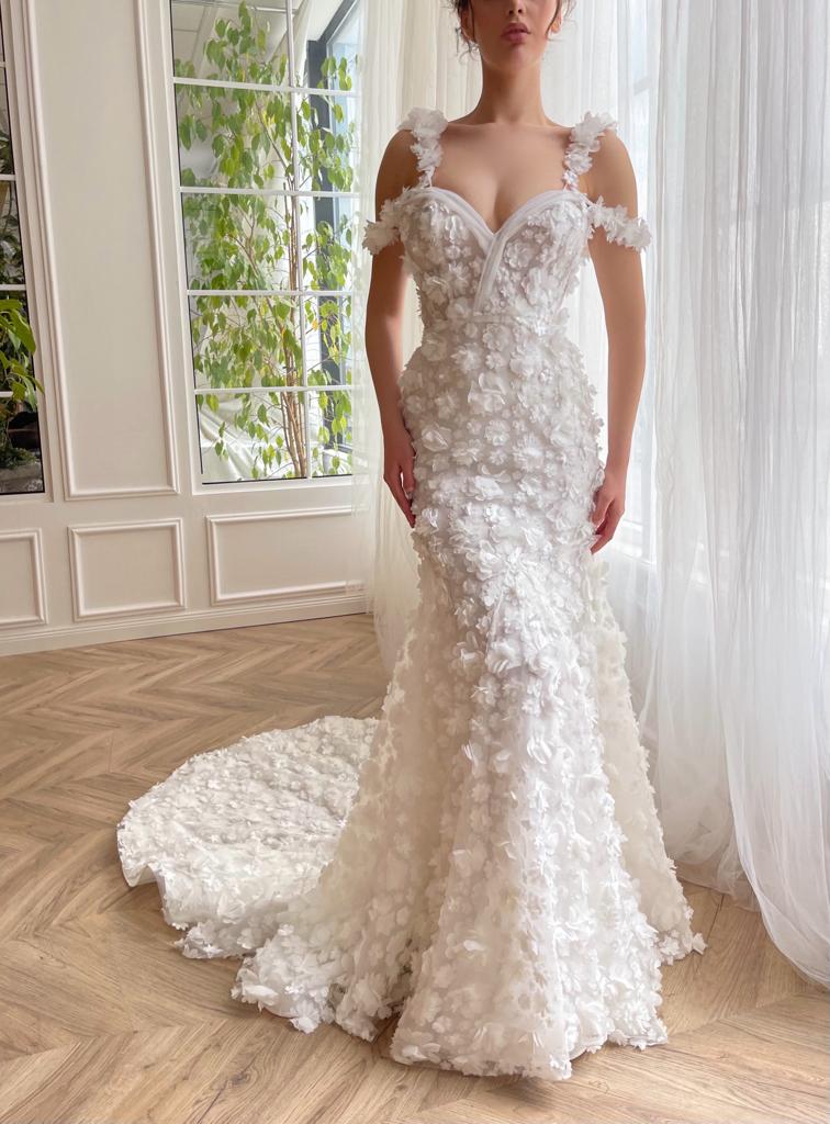 White mermaid bridal dress with off the shoulder sleeves, spaghetti straps, lace and embroidery