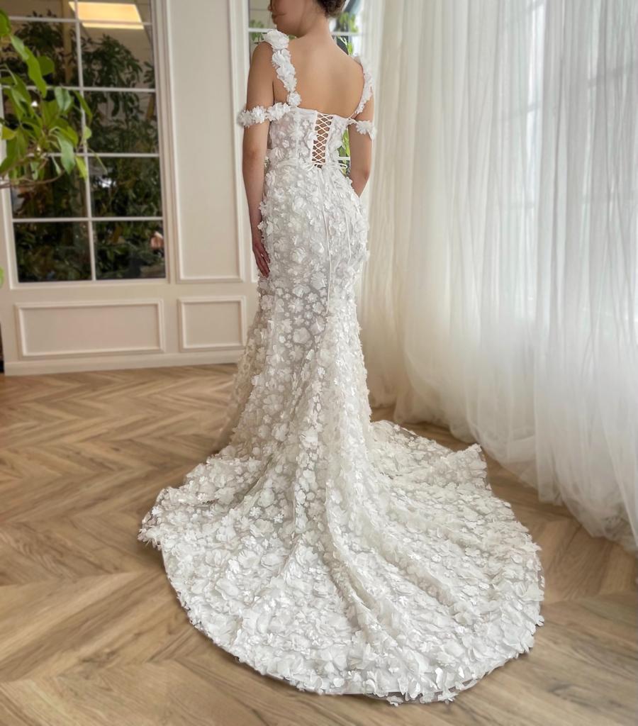 White mermaid bridal dress with off the shoulder sleeves, spaghetti straps, lace and embroidery