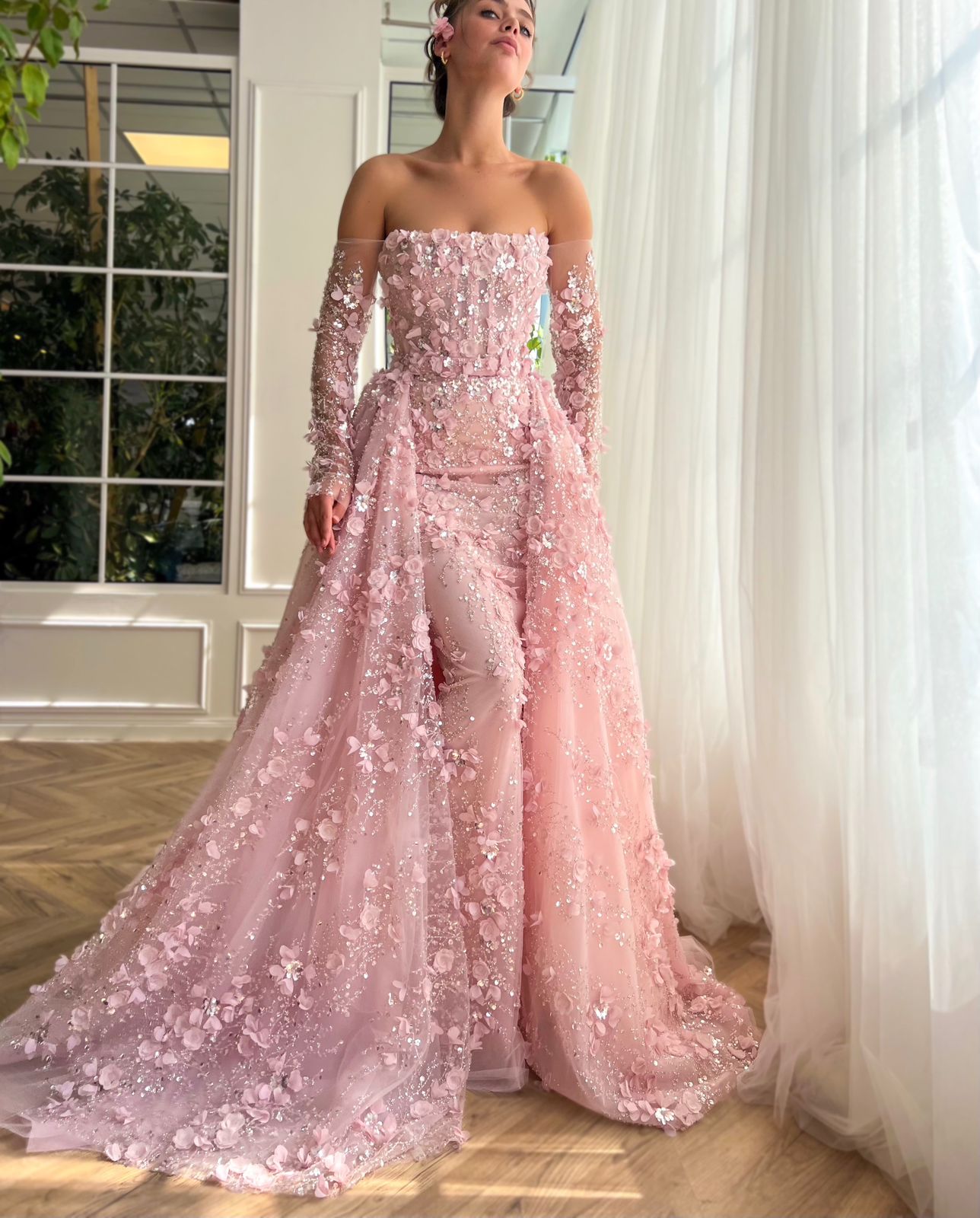 Pink overskirt and A-Line dress with long off the shoulder sleeves and embroidery