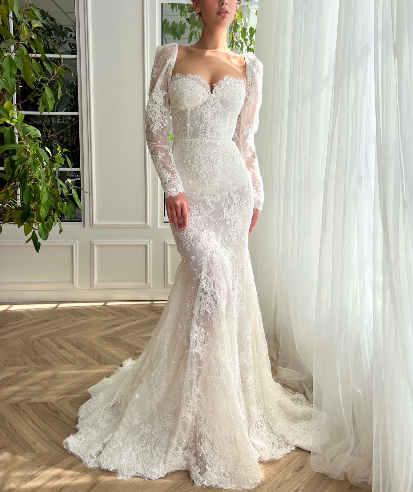 Mermaid white bridal dress with long sleeves and embroidery