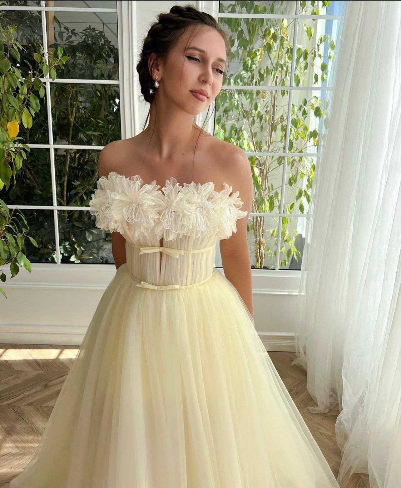 Yellow A-Line dress with no sleeves and embroidery