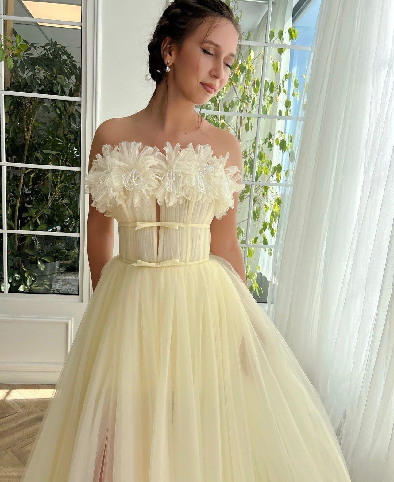 Yellow A-Line dress with no sleeves and embroidery