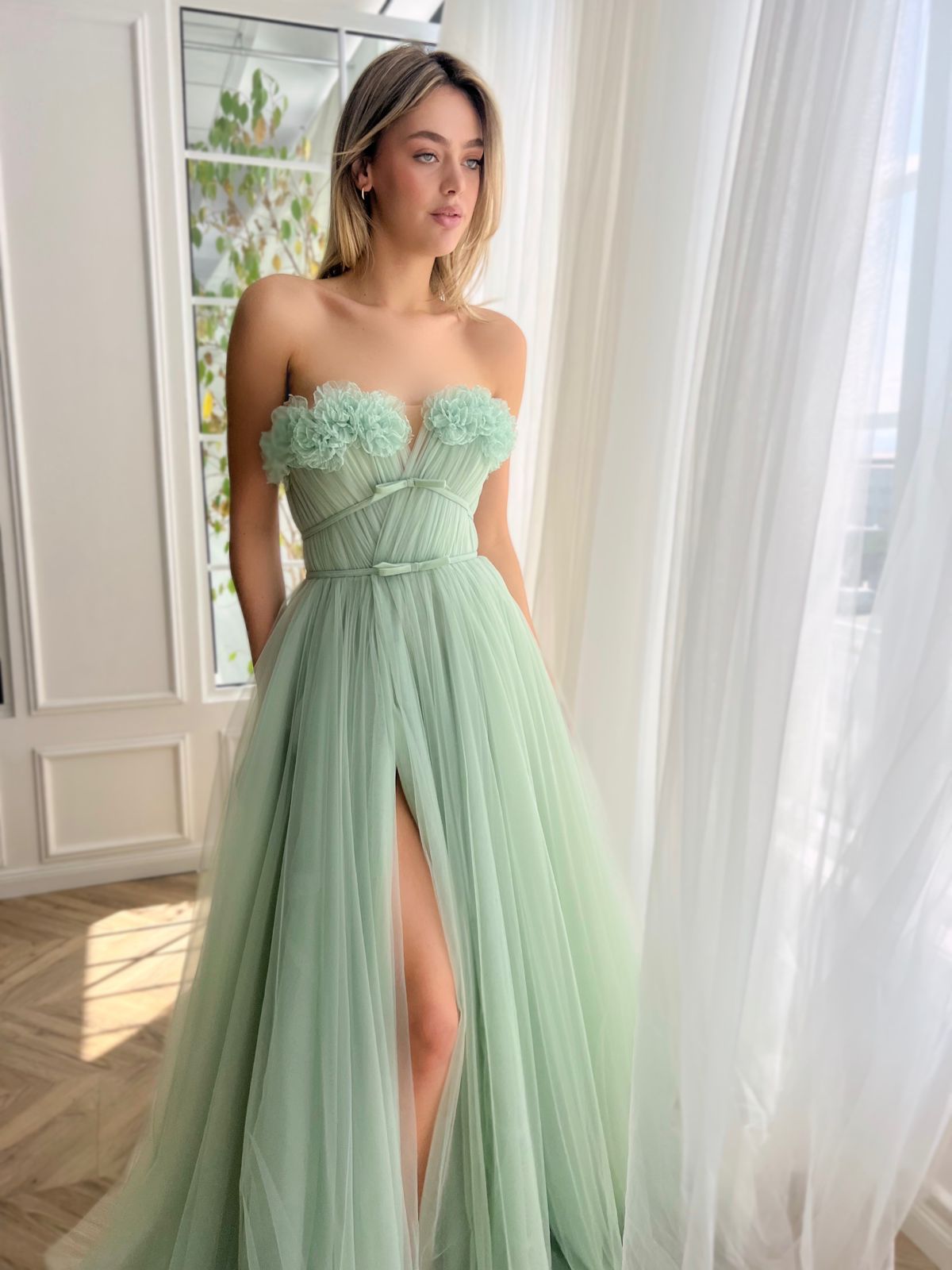 Green A-Line dress without sleeves and with embroidery