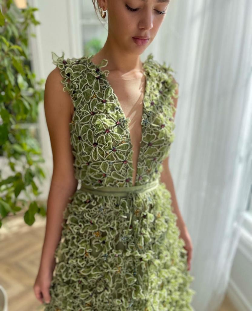 Green A-Line dress with no sleeves, v-neck and embroidery