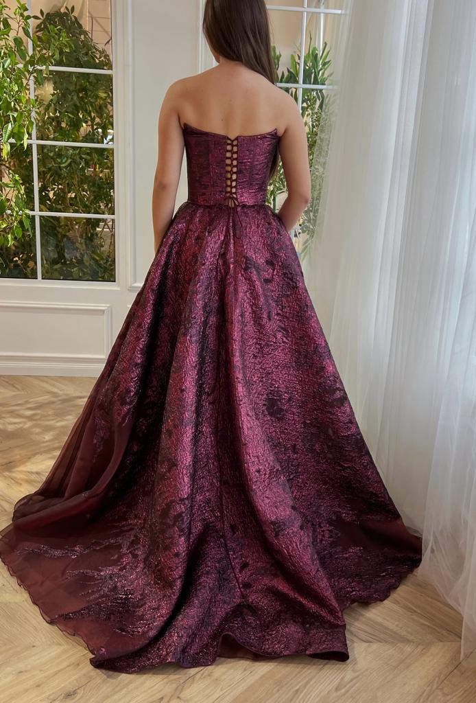 Purple A-Line dress with brocade fabric and no sleeves