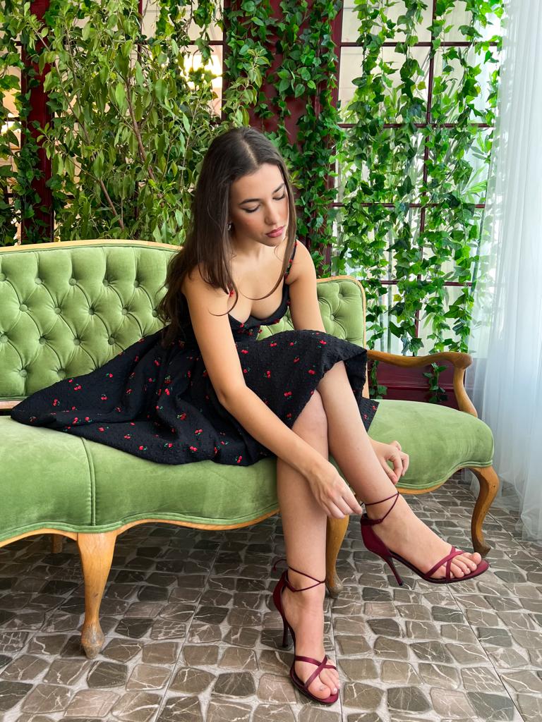 Black mini dress with embroidered cherries and straps