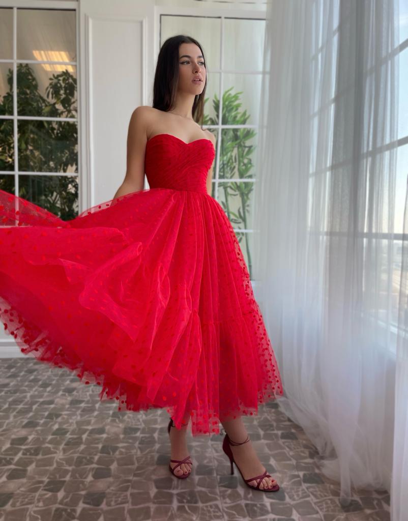 Red dotted midi dress with no sleeves and gloves