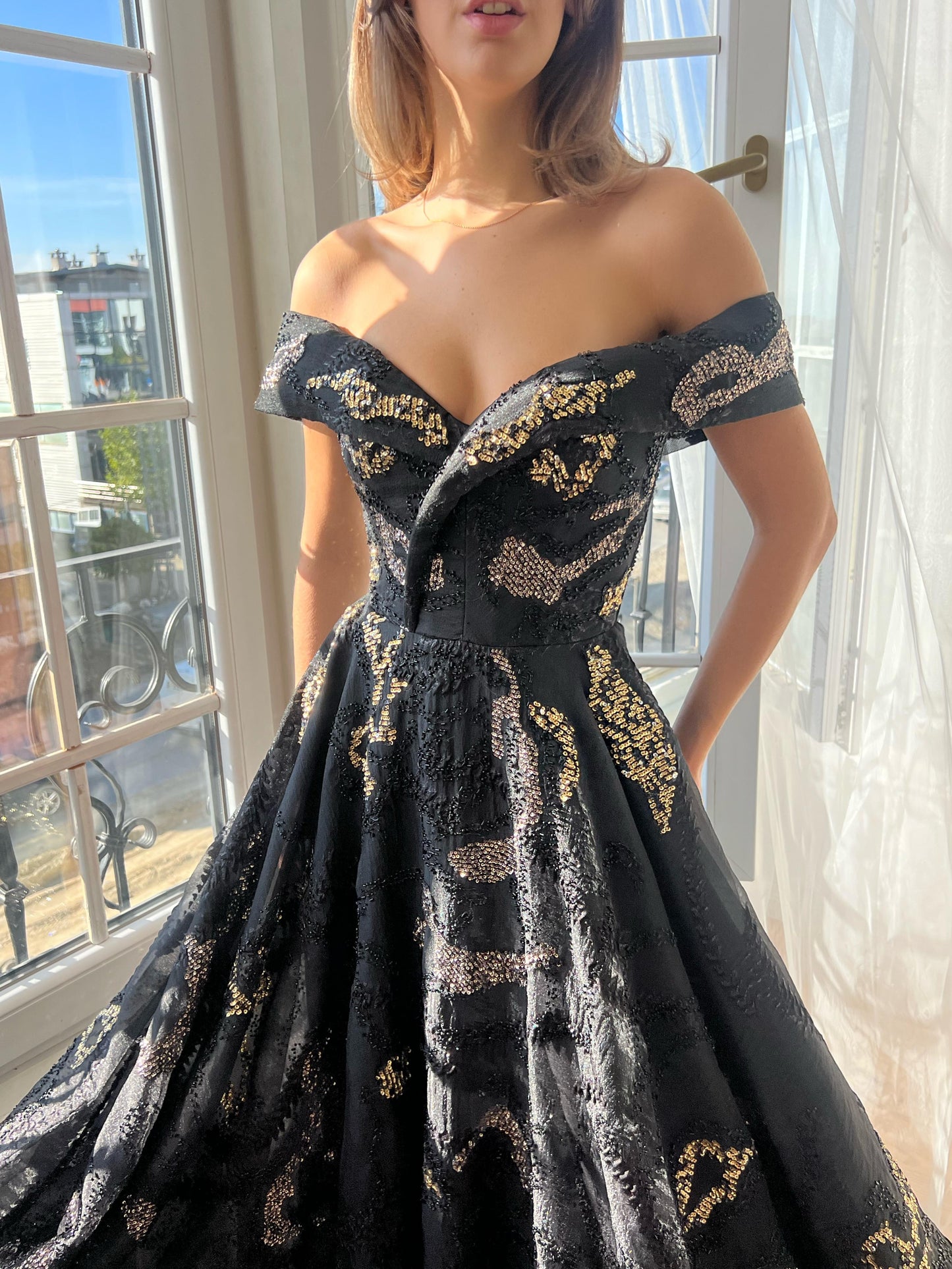 Black A-Line dress with off the shoulder sleeves, brocade fabric and embroidery