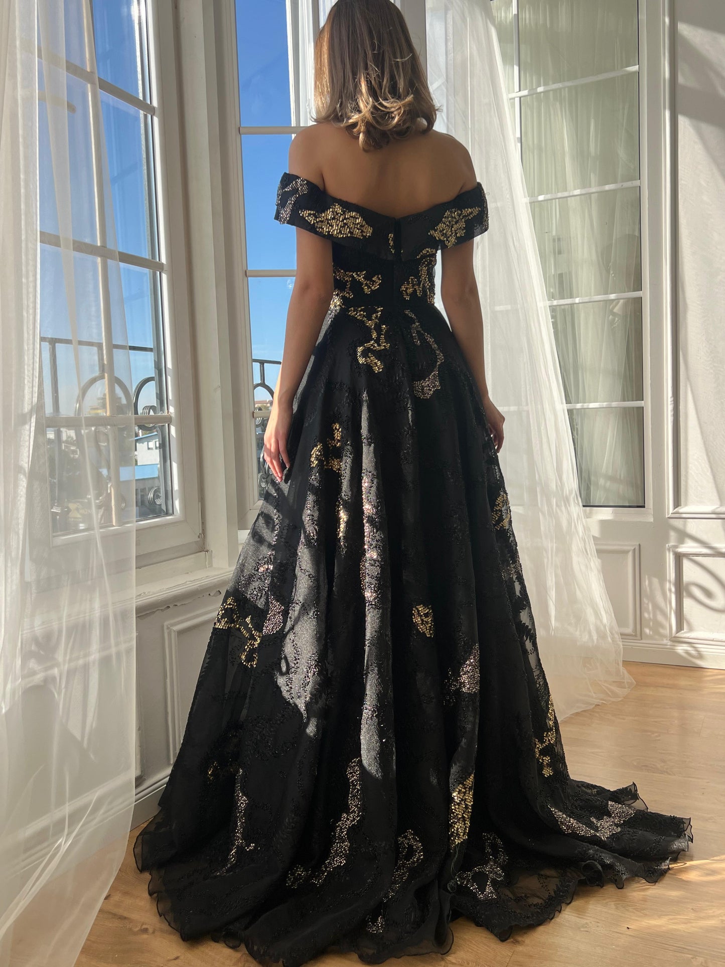 Black A-Line dress with off the shoulder sleeves, brocade fabric and embroidery