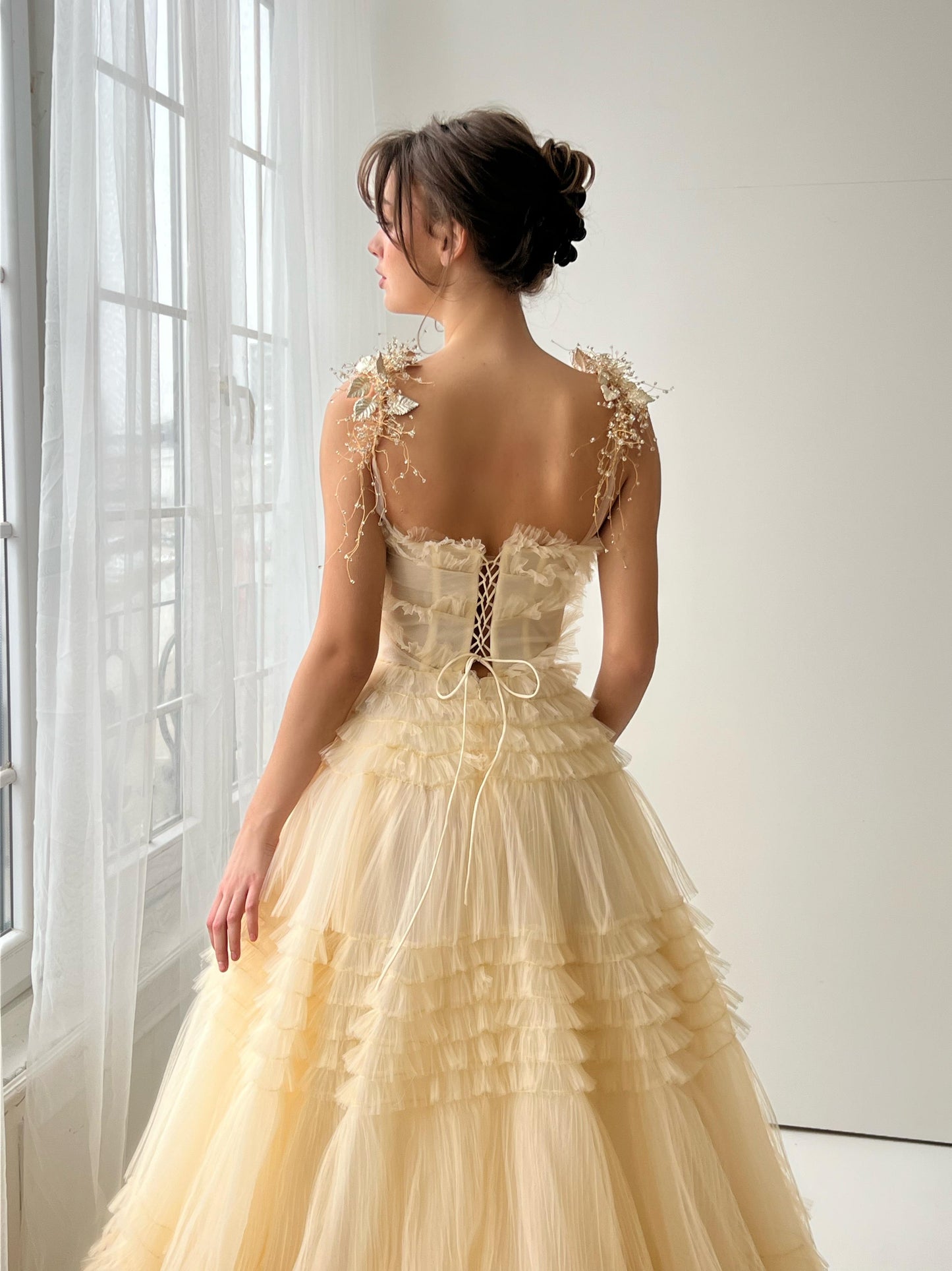 Beige A-Line dress with ruffles, spaghetti straps and embroidery