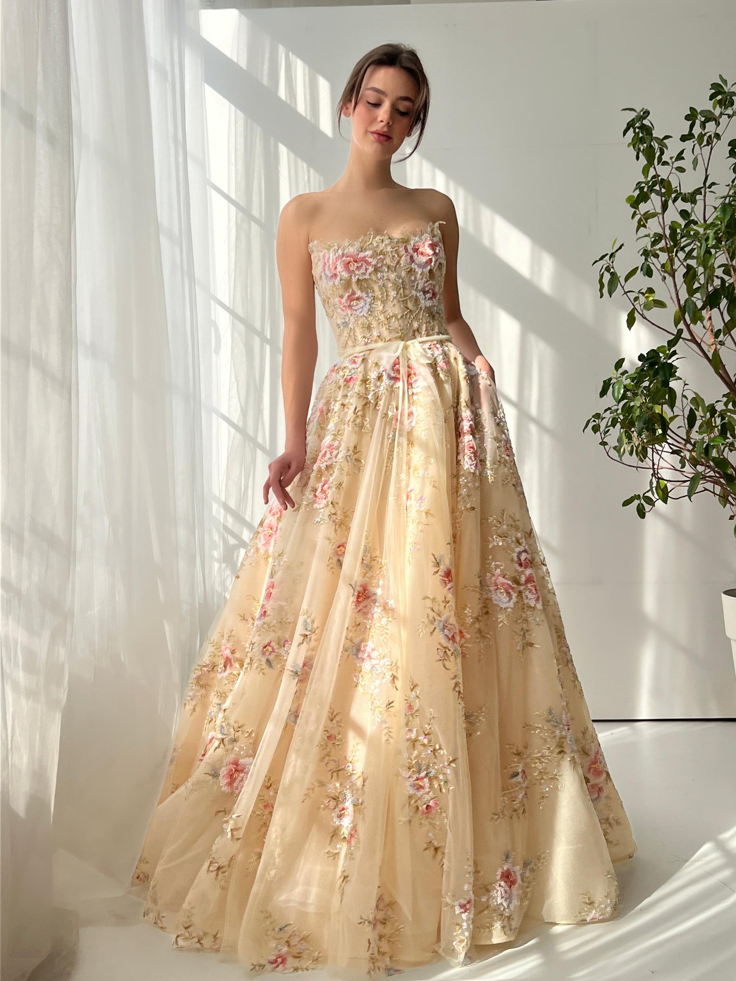 Beige A-Line dress with embroidery and sleeveless