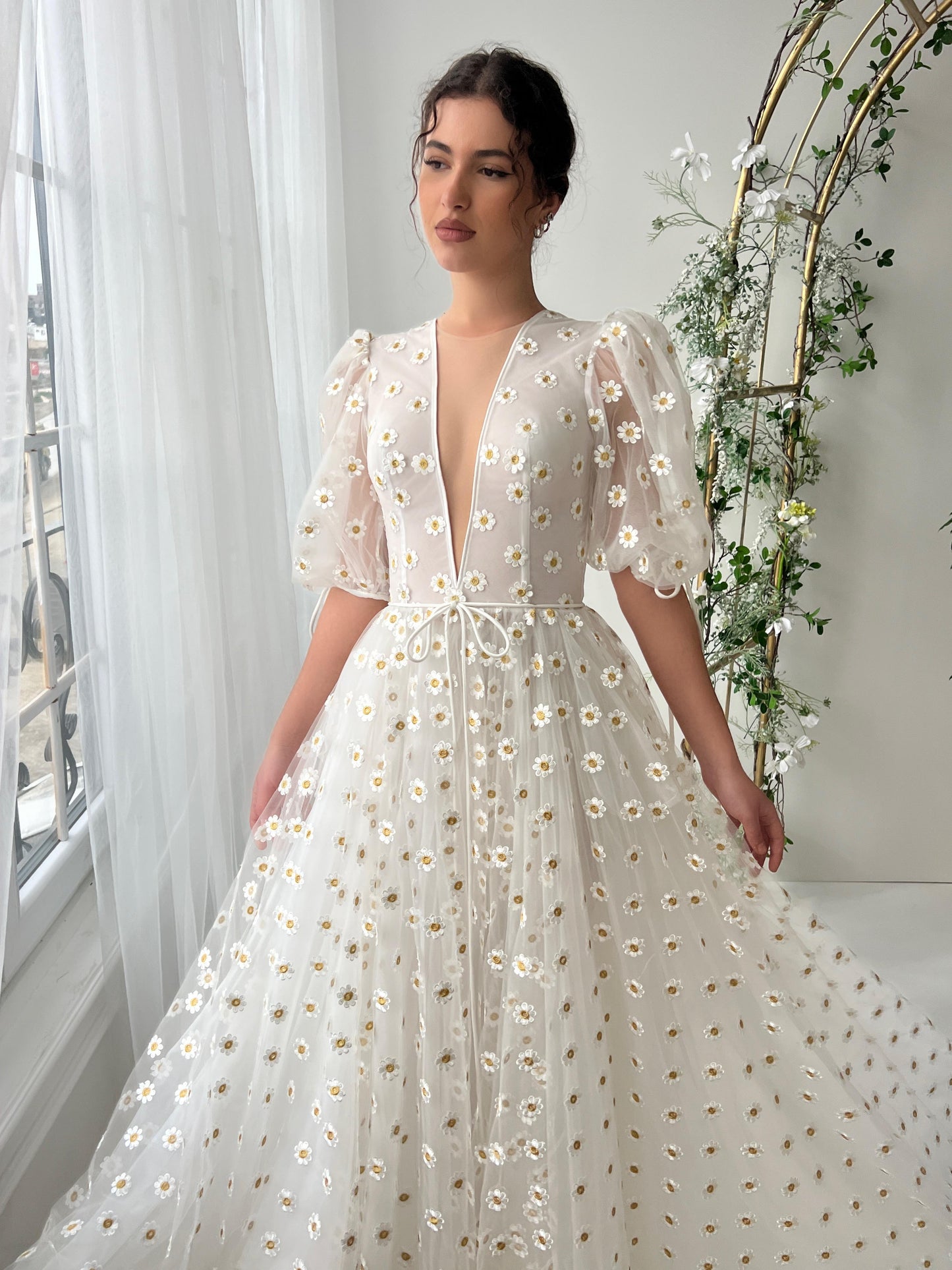 White A-Line dress with short sleeves, v-neck and daisies