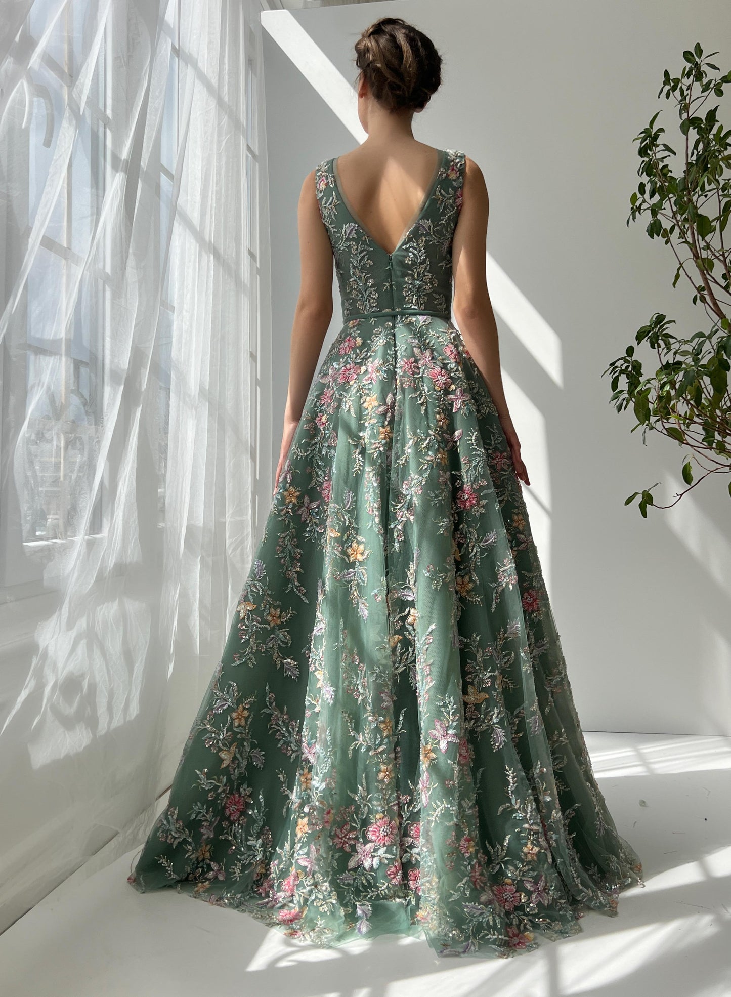 Green A-Line dress with v-neck, embroidery and no sleeves