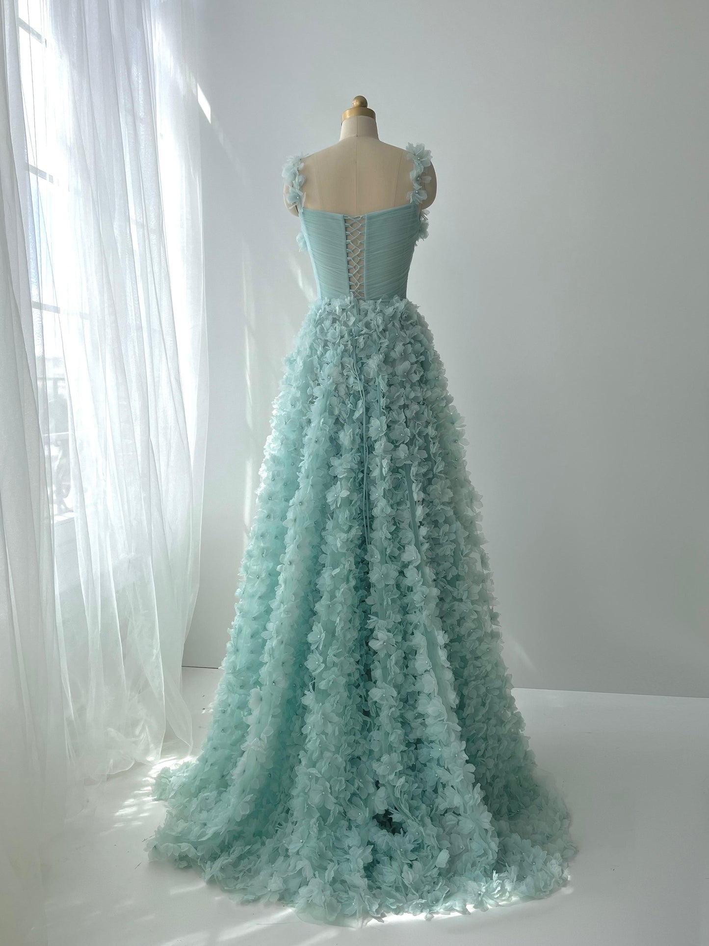 Blue A-Line dress with straps and embroidered flowers