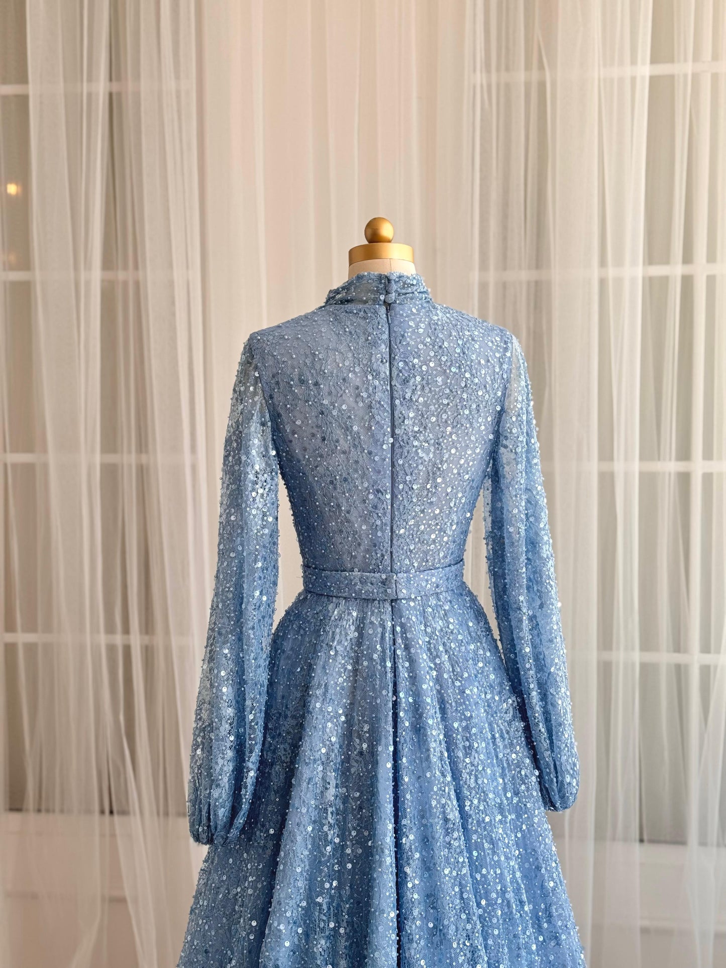 Blue A-Line dress with long sleeves, v-neck and sequin fabric