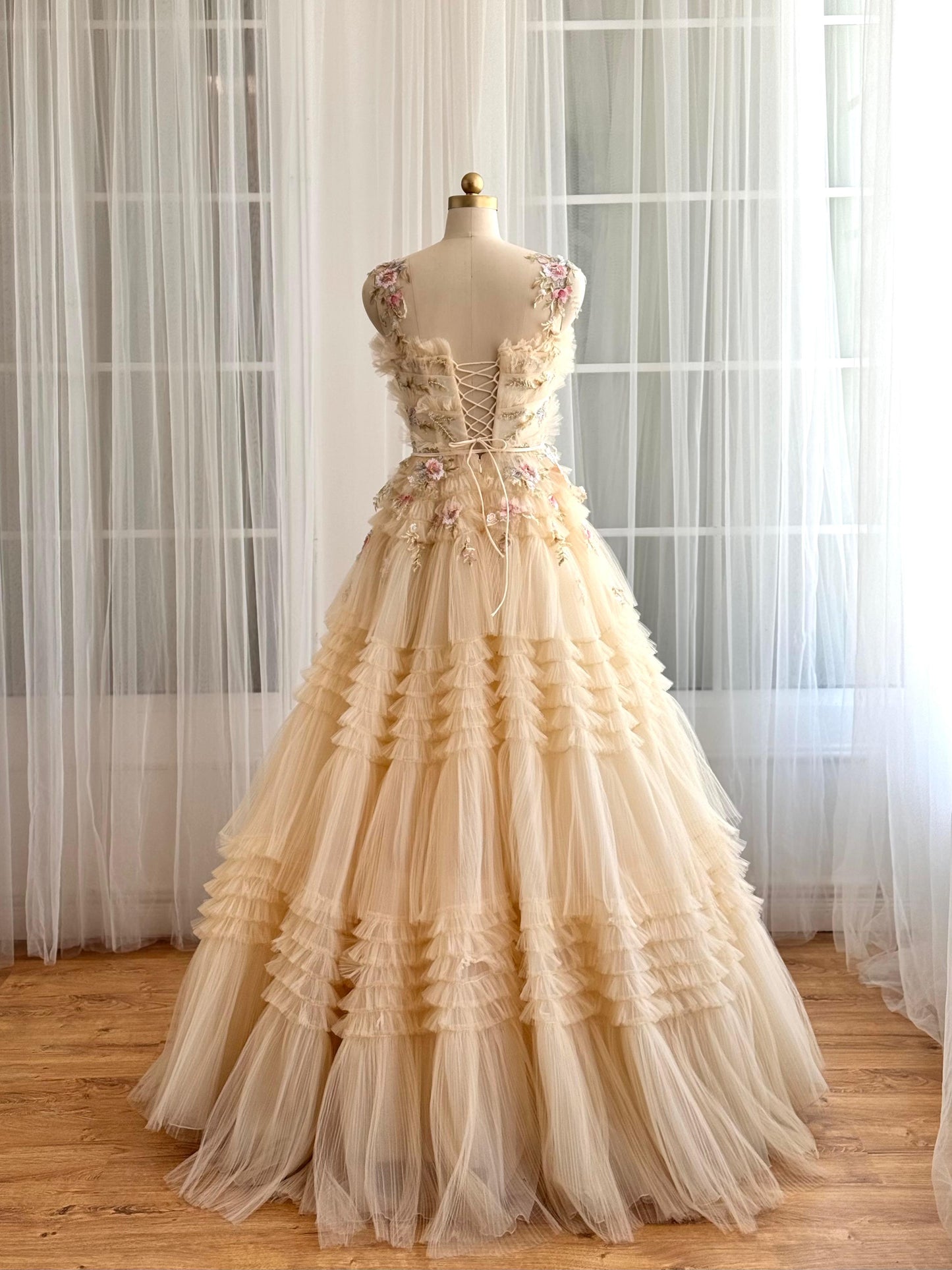 Beige A-Line dress with embroidery, floral straps and ruffles