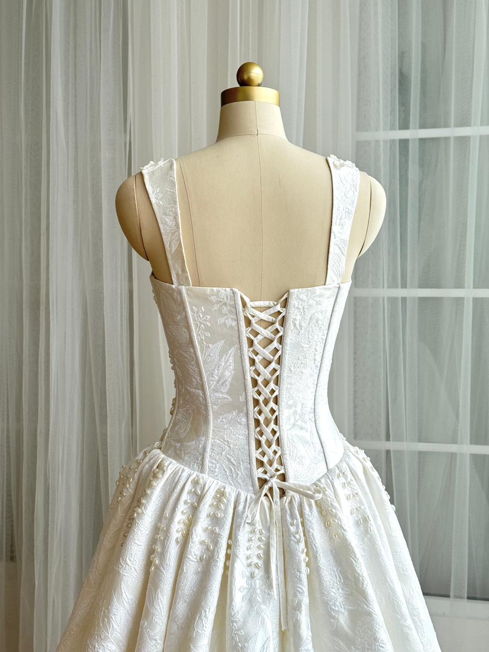 White A-Line bridal gown with straps, beading and embroidery