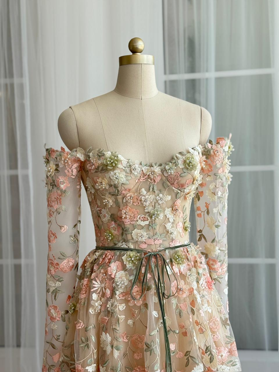 Beige A-Line dress with long off the shoulder sleeves and embroidery